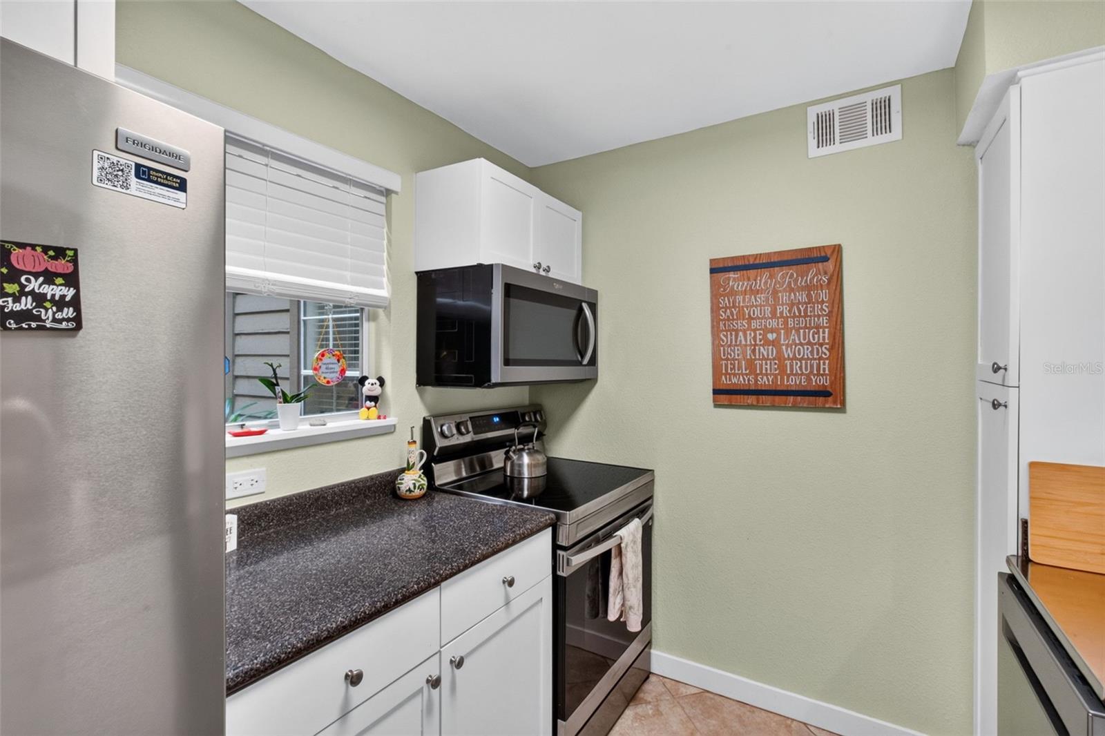 Kitchen, all new stainless steel appliances - 2500 WINDING CREEK BLVD #I106, CLEARWATER