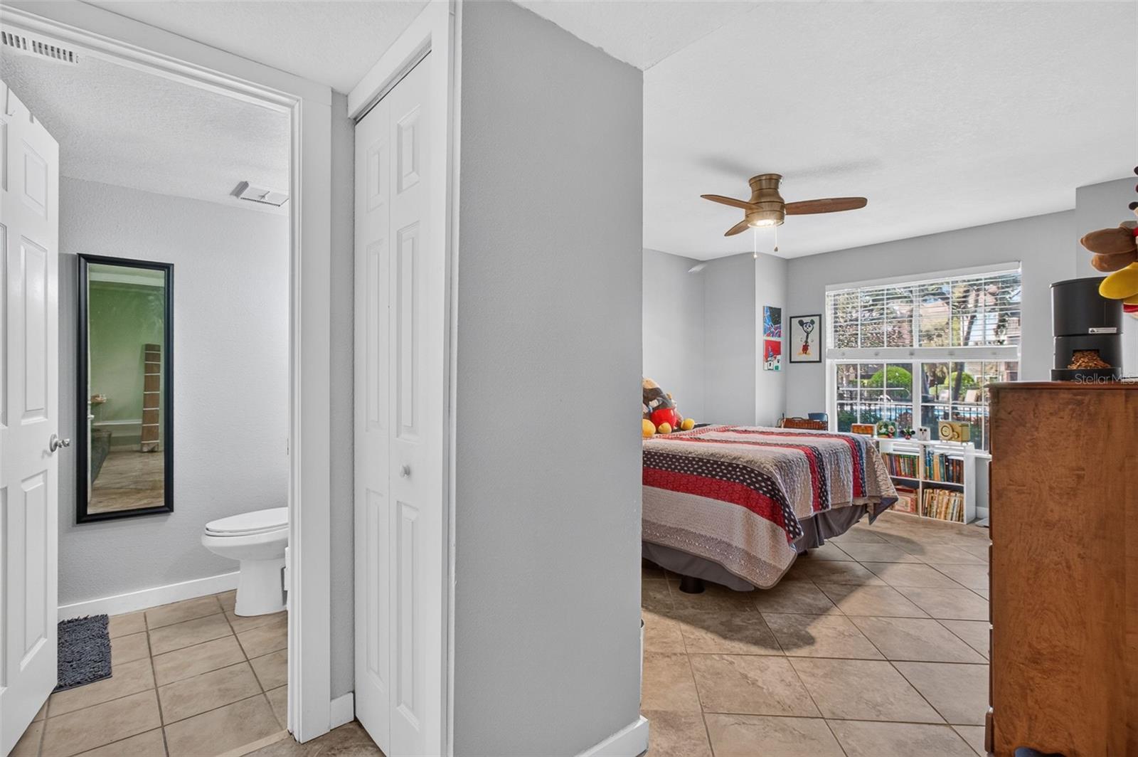 View of primary suite from living room - 2500 WINDING CREEK BLVD #I106, CLEARWATER