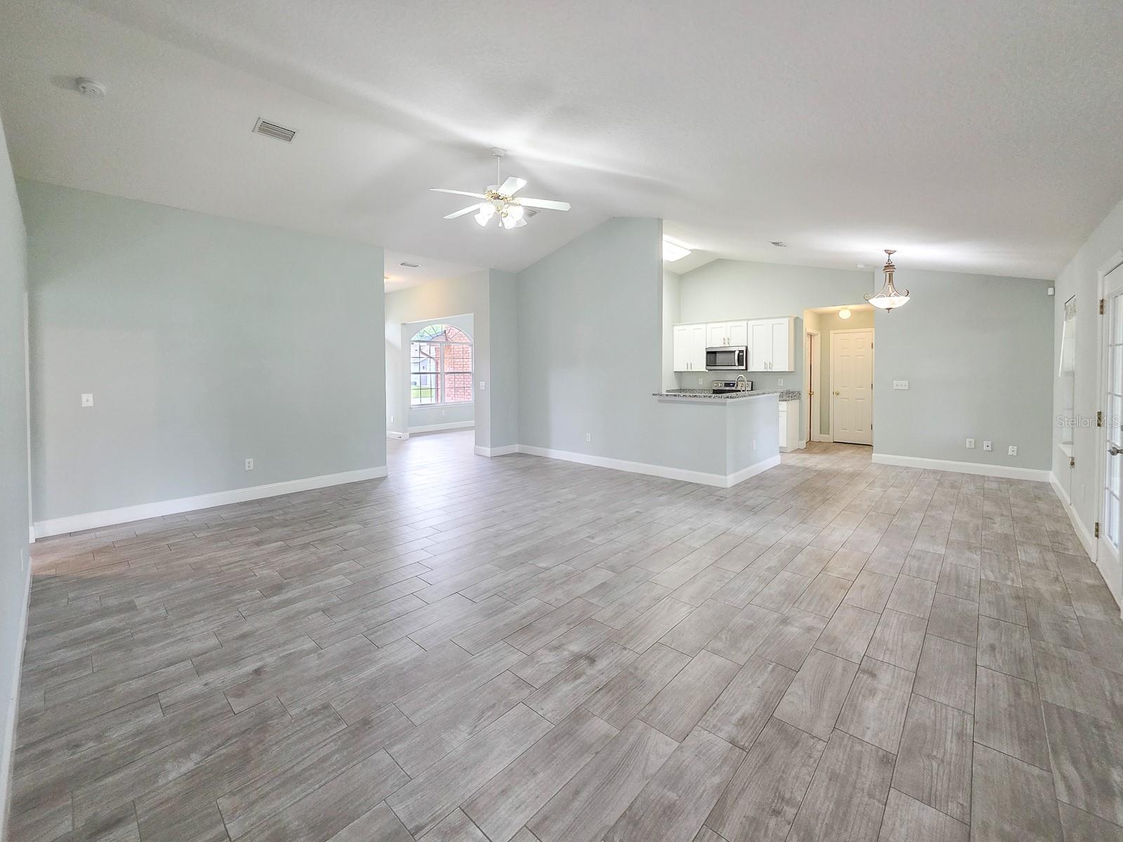 Great room and breakfast area - 4 LLOWICK CT, PALM COAST