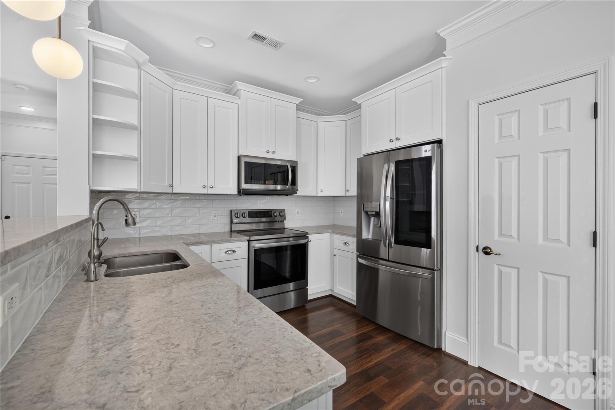 Kitchen with generous storage, keeping everything within reach - 12520 Vantage Point Lane, Huntersville