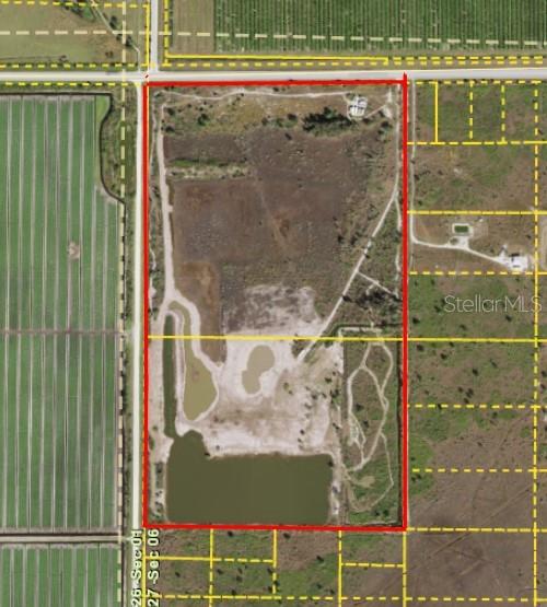 This is the aerial of the 70 acres in Charlotte Harbor Highlands Subd. - 48091 BERMONT RD, PUNTA GORDA