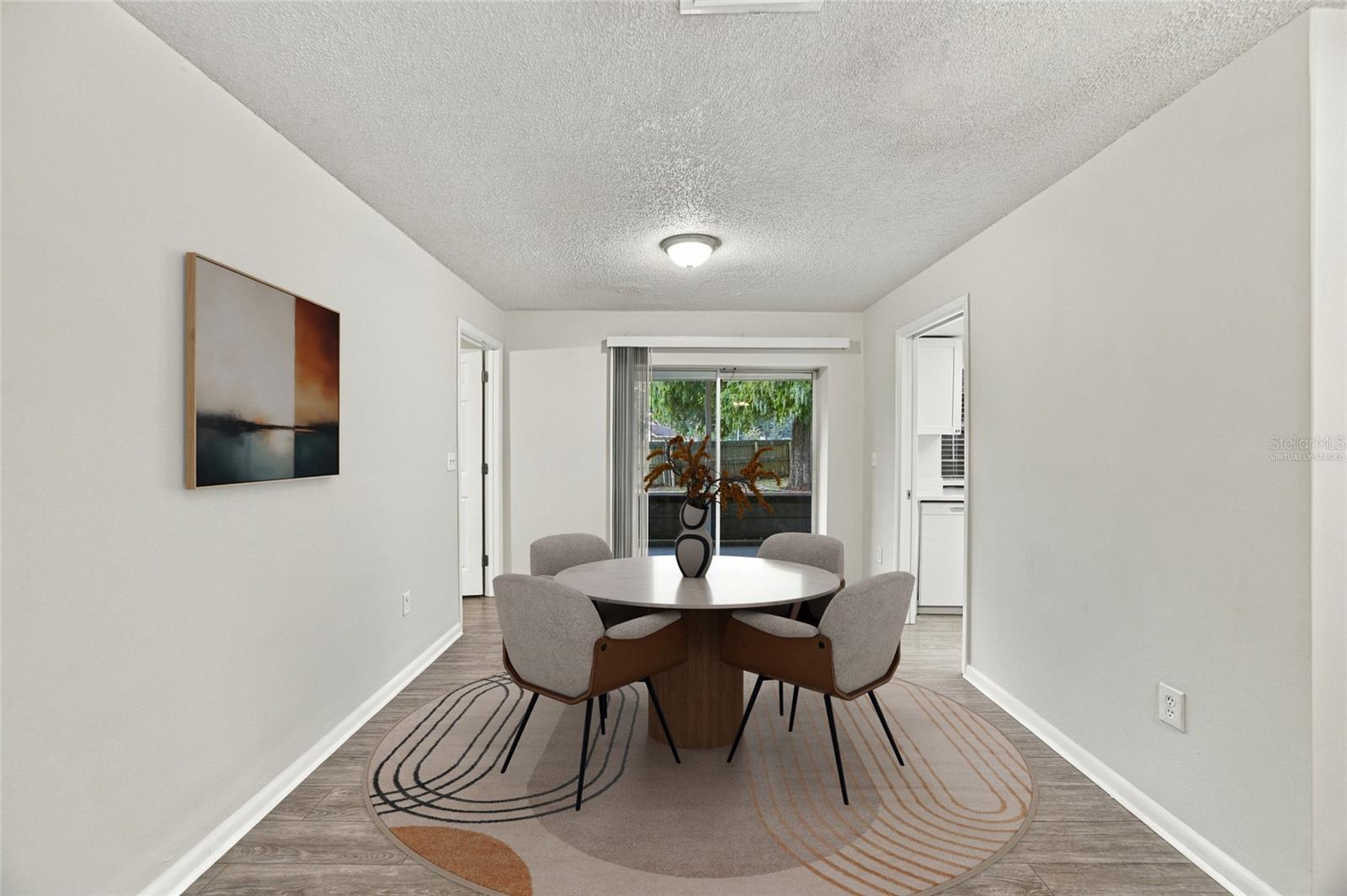 Virtually Staged* Dining Room - 2704 WOODVIEW CT, CLEARWATER