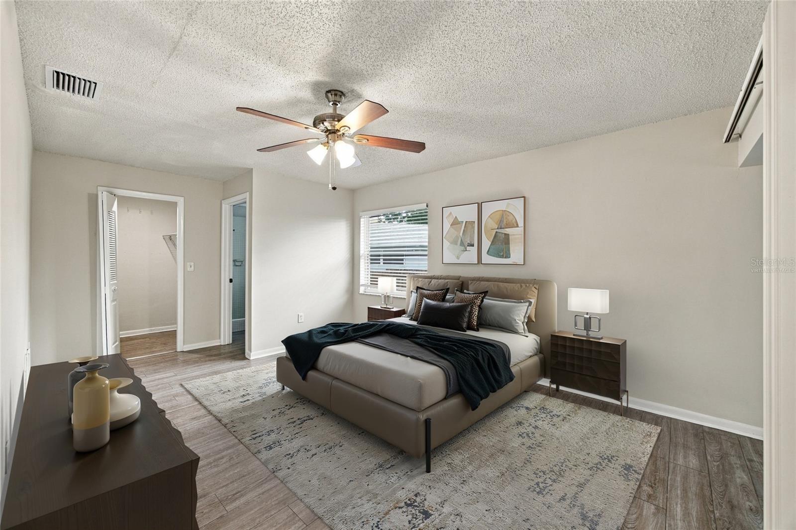 Virtually Staged* Primary Bedroom - 2704 WOODVIEW CT, CLEARWATER