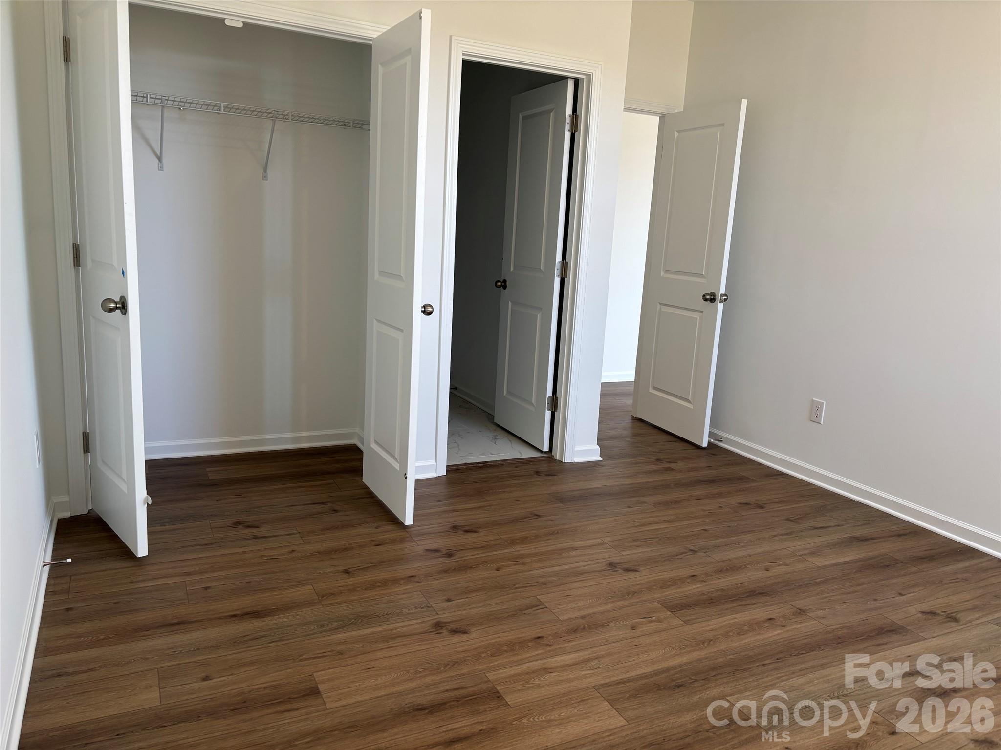 closet, door to the private full bath... and did you notice that there is no carpet! - 1735 Grassy Knoll Trail, Maiden