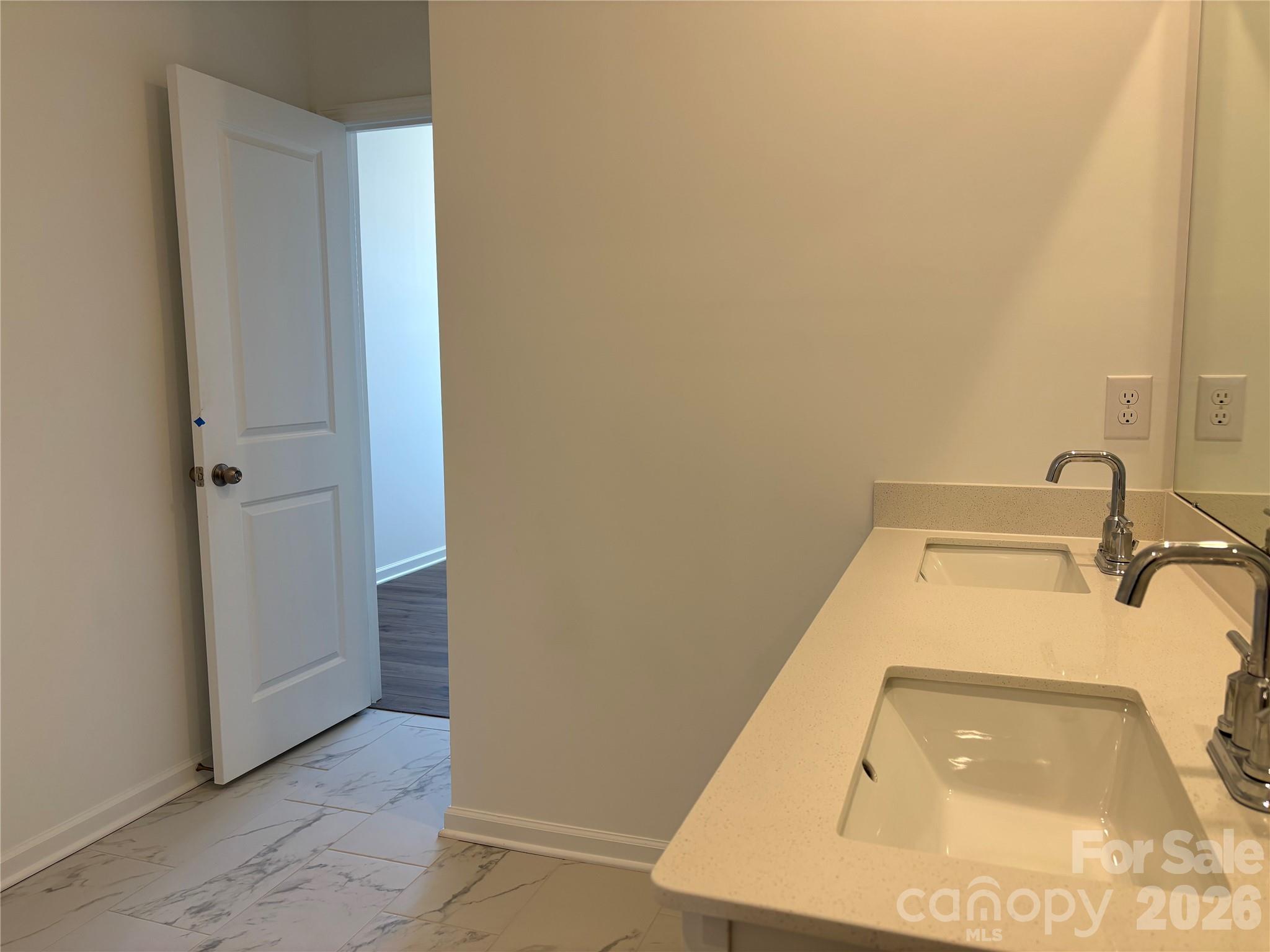 Even double sinks - and don't forget that there is a half bath on the main floor as well. - 1735 Grassy Knoll Trail, Maiden