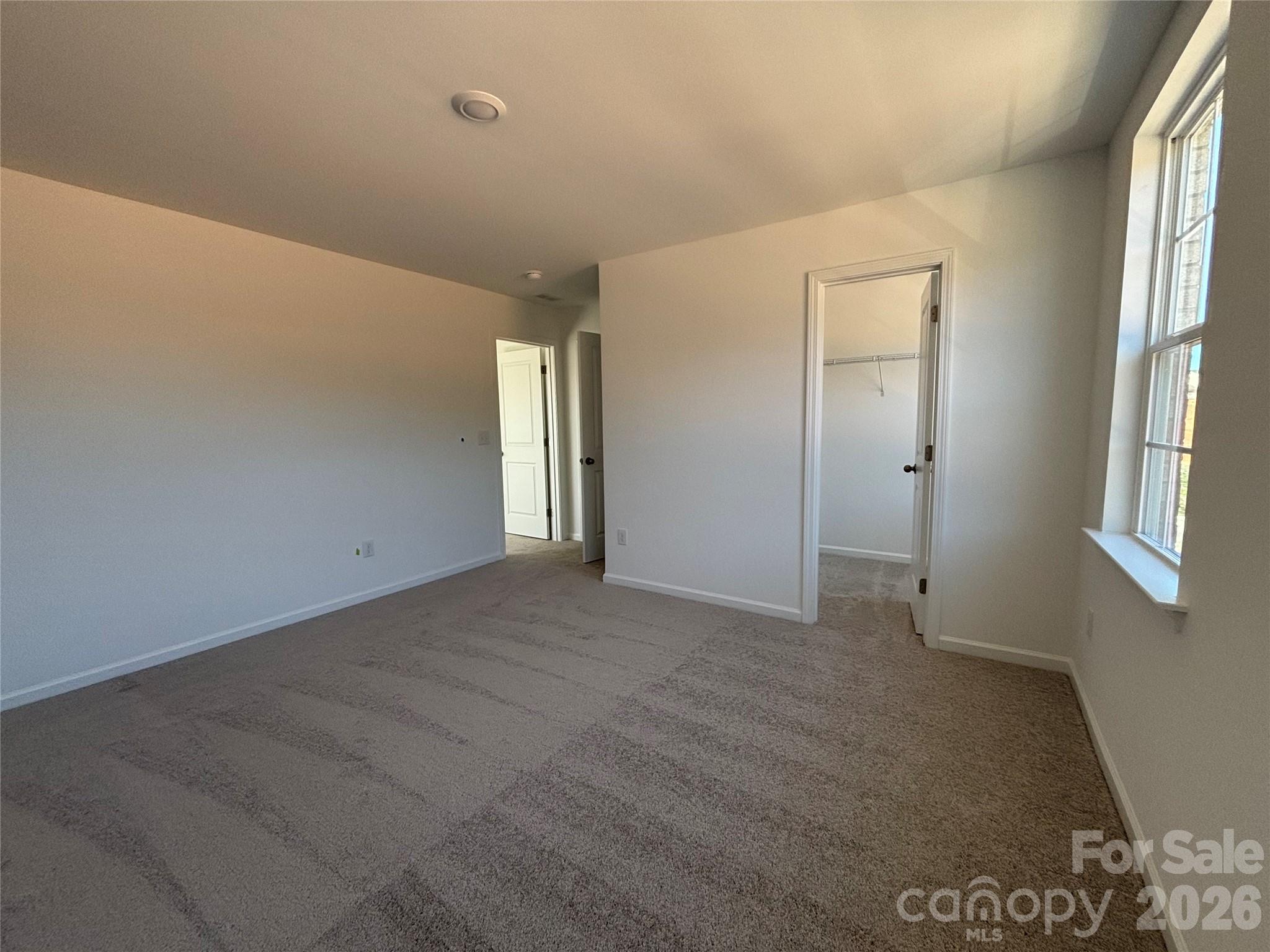 another angle of the primary bedroom - 1735 Grassy Knoll Trail, Maiden