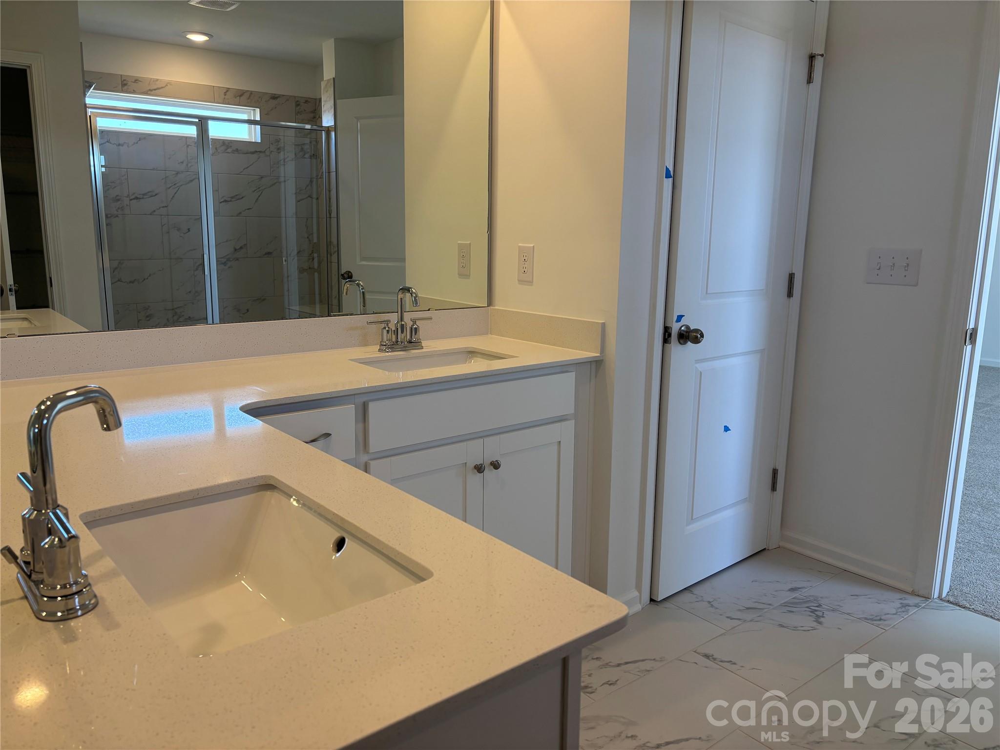 Double sinks in your primary bath... you get a side and you get a side and let's see who is messy and who isn't! - 1735 Grassy Knoll Trail, Maiden
