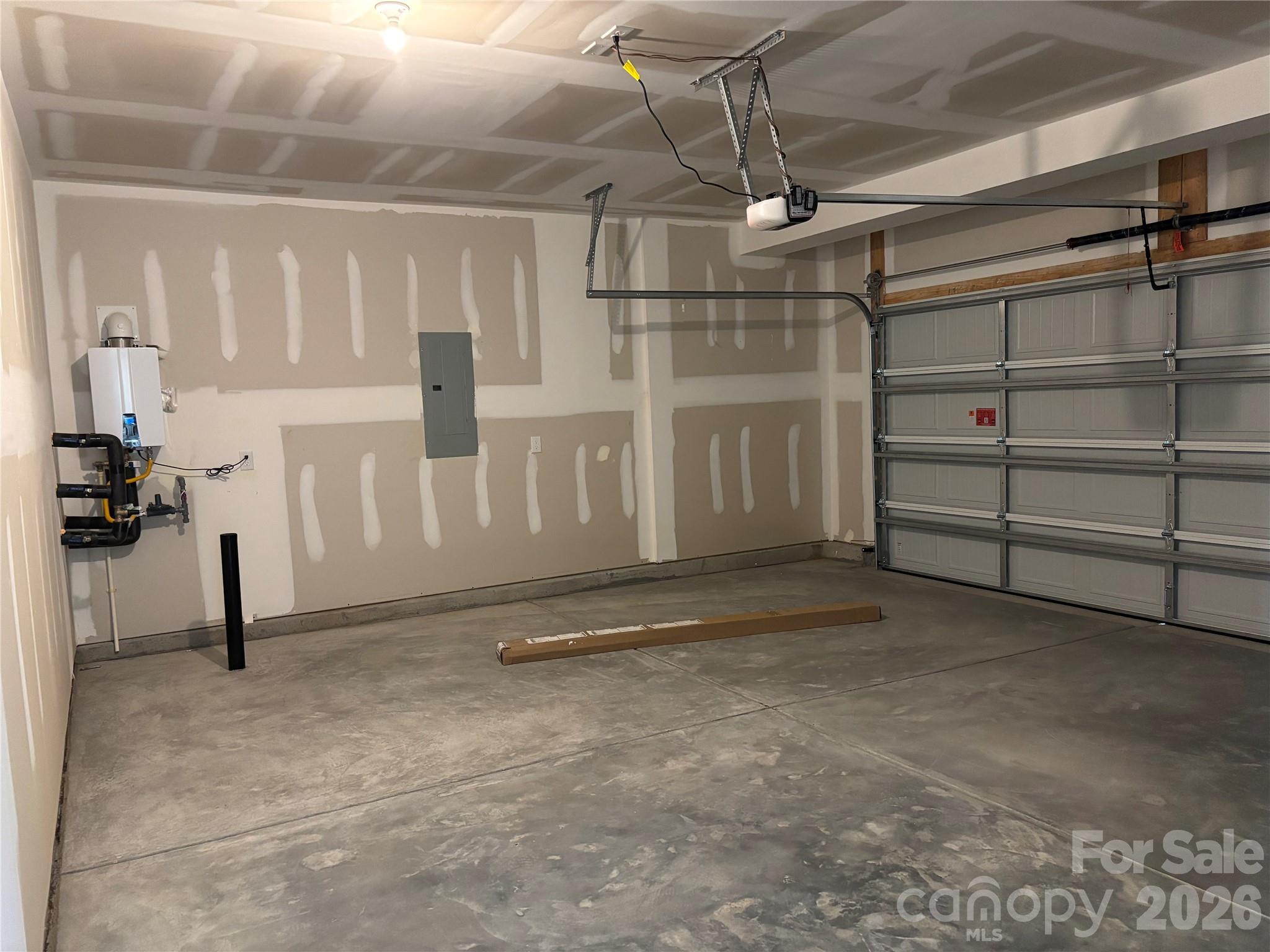 Two car garage ... check out your tankless hot water heater! - 1735 Grassy Knoll Trail, Maiden
