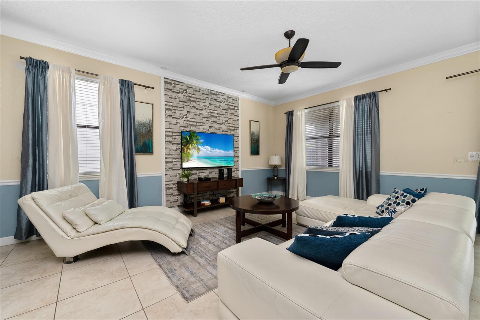 Plenty of Room to Gather, Relax and Enjoy Time Together in This Spacious Main Living Area - 1520 MOON VALLEY DR, DAVENPORT