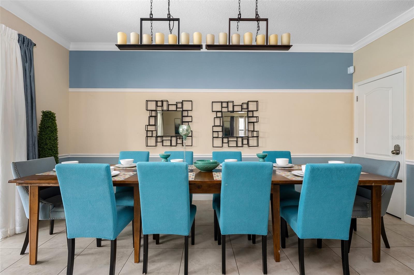 Gather Around the Table! Generous Dining Space with Elegant Statement Lighting and Seating for Large Groups - 1520 MOON VALLEY DR, DAVENPORT