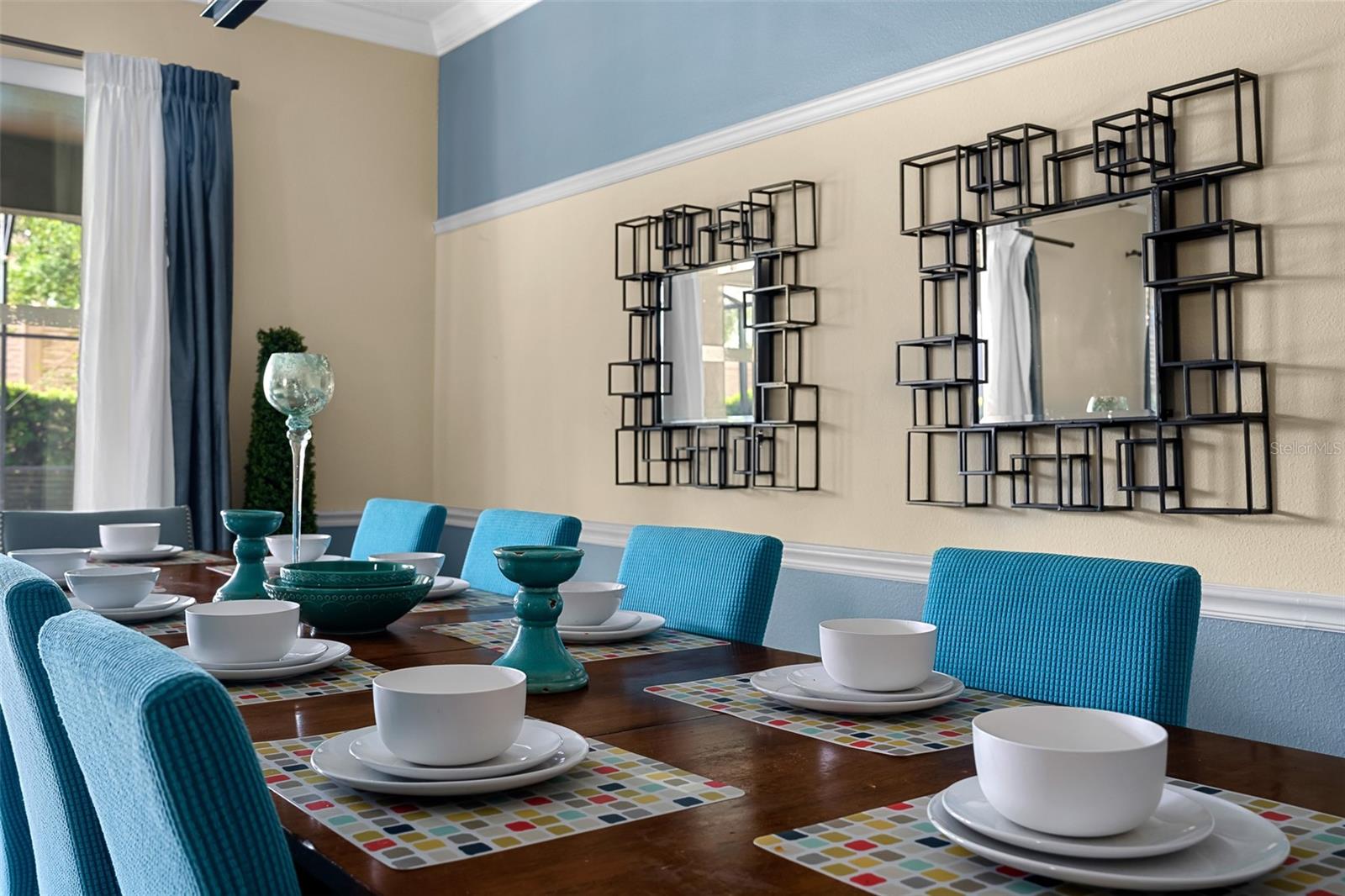 Thoughtful Decorative Details and Stylish Blue Accents Create an Inviting Dining Experience - 1520 MOON VALLEY DR, DAVENPORT