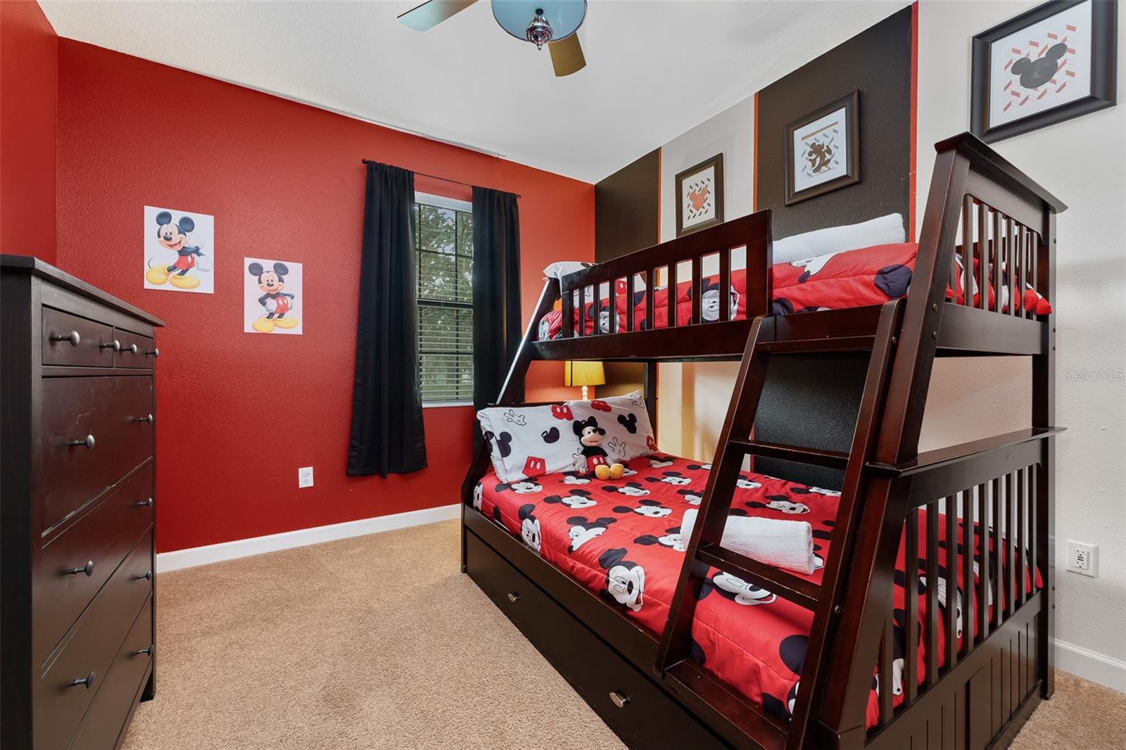 Mickey-Themed Bedroom with Playful Red Accents and Twin-Over-Full Bunk Bed - 1520 MOON VALLEY DR, DAVENPORT