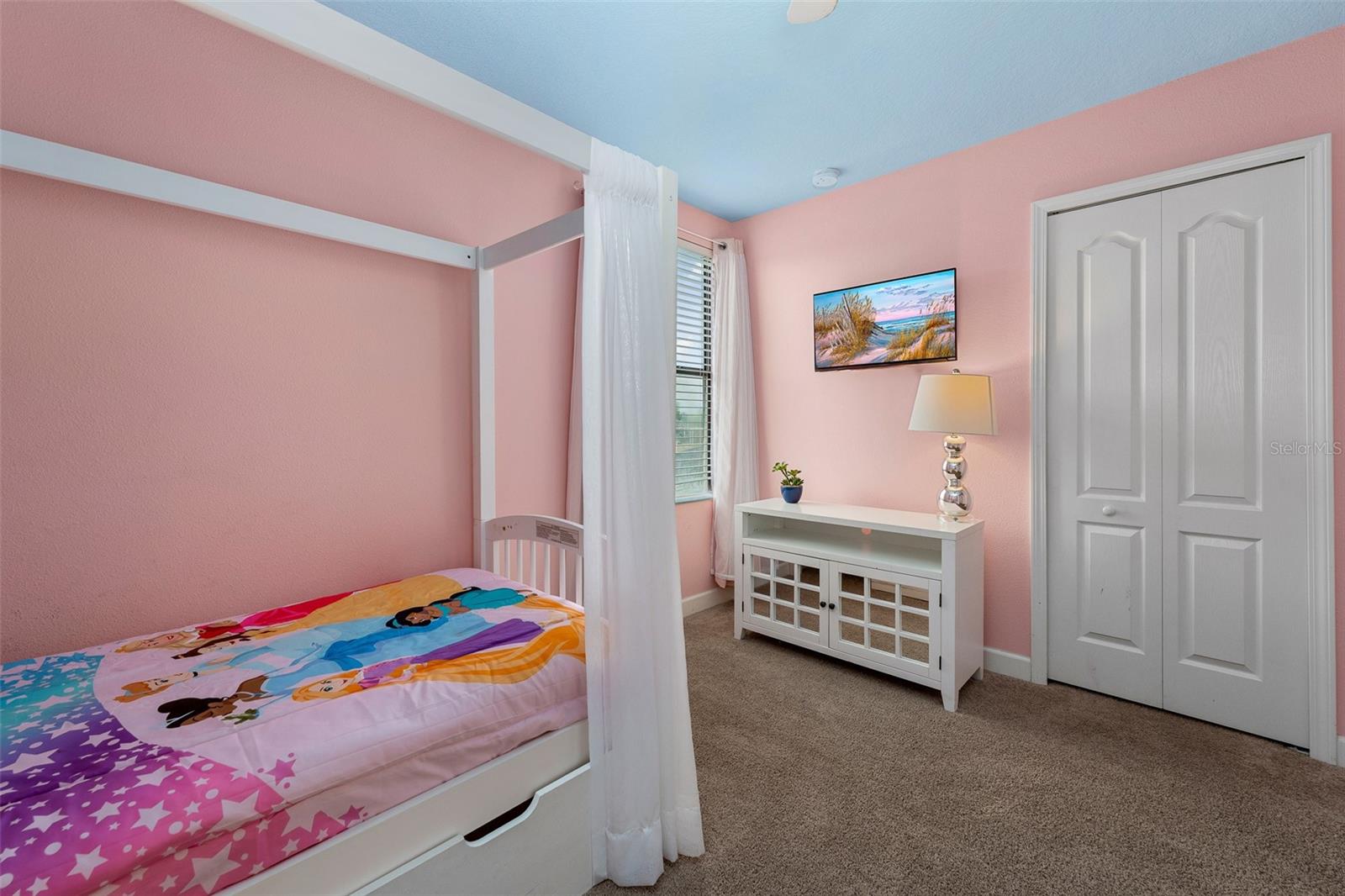 Additional View of the Princess Bedroom with Whimsical Furnishings and Cheerful Details - 1520 MOON VALLEY DR, DAVENPORT