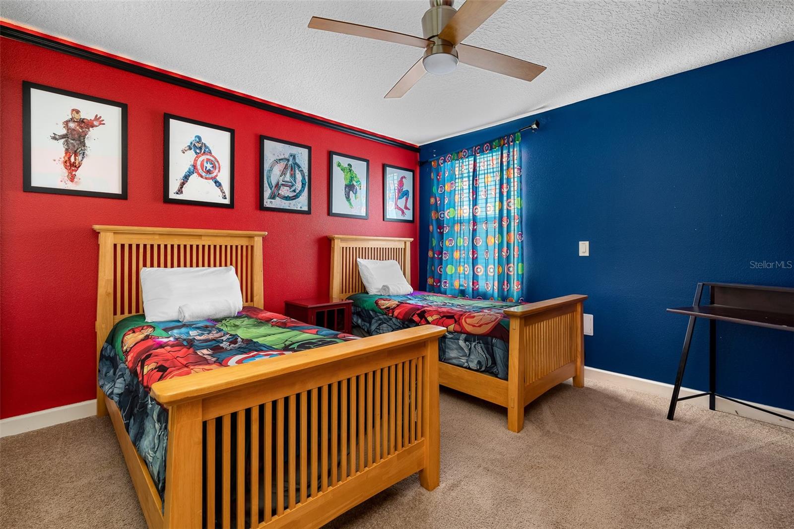 Avengers Assemble! Colorful Superhero-Themed Bedroom with Twin Beds and Bold Red and Blue Accents - 1520 MOON VALLEY DR, DAVENPORT