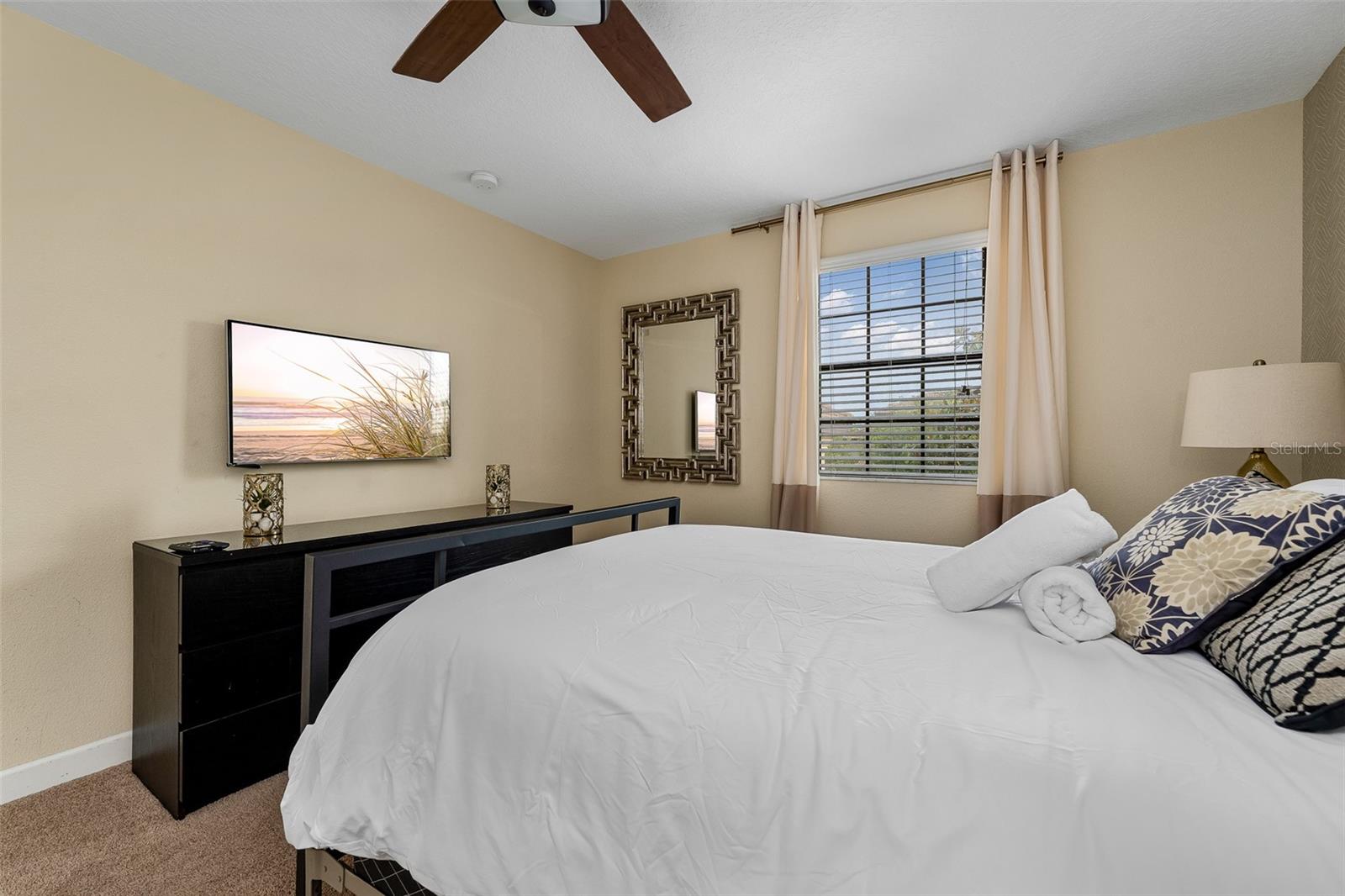 Additional View of the Upstairs Primary Suite with Comfortable Accommodations and Natural Light - 1520 MOON VALLEY DR, DAVENPORT