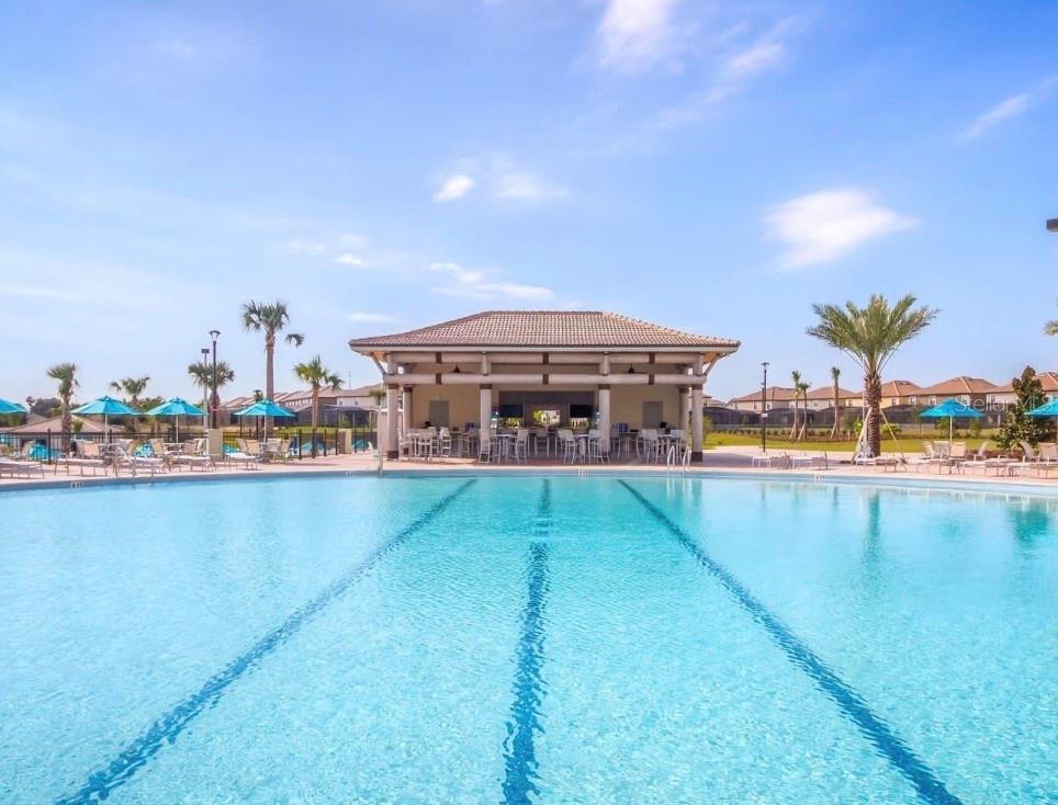 Enjoy the Oasis Club's Resort-Style Pools and Tropical Waterpark Setting - 1520 MOON VALLEY DR, DAVENPORT