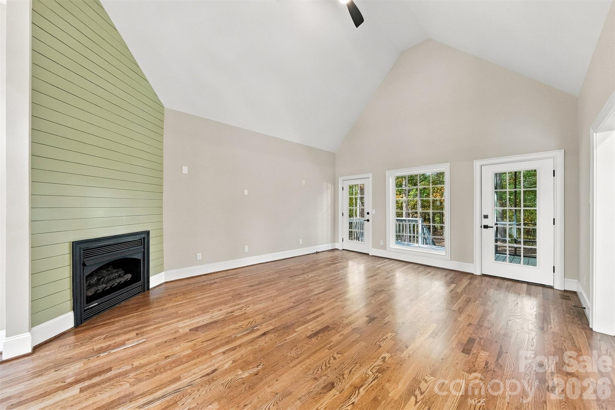 Two outdoor glass doors that lead to the screened-in porch and back deck! - 3442 Sourwood Court, Lincolnton