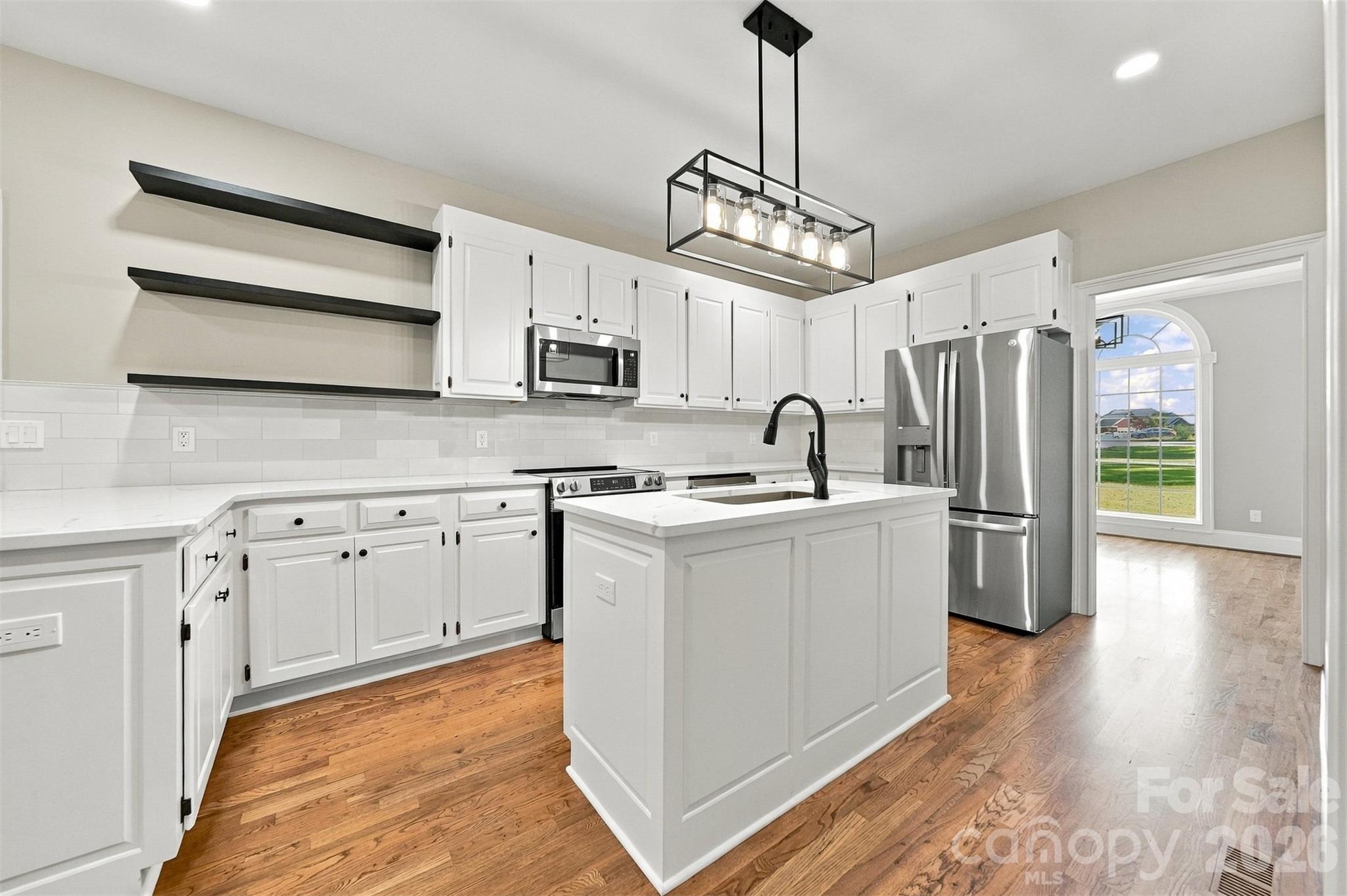 Floating shelves in the kitchen is all the rage! - 3442 Sourwood Court, Lincolnton