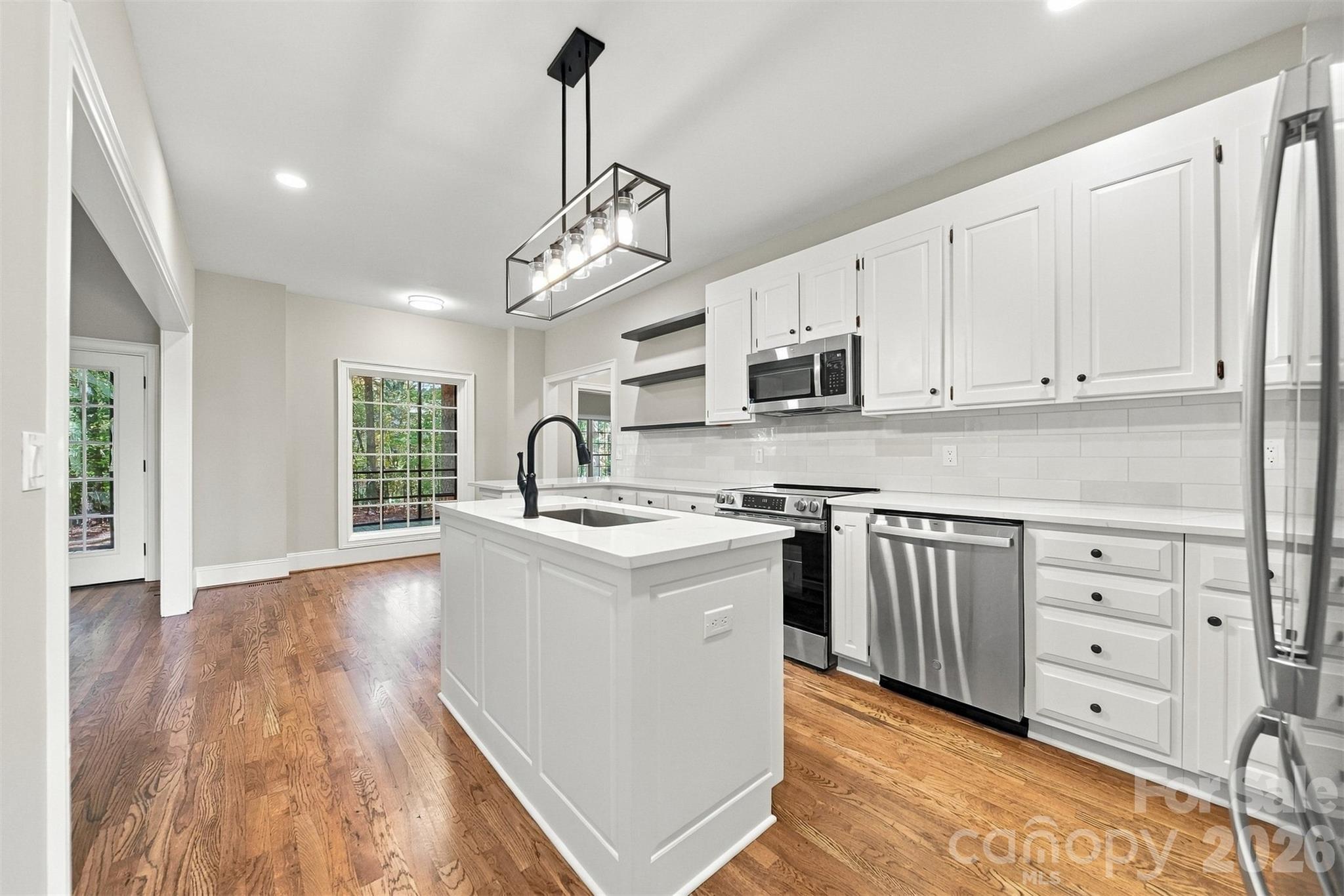 subway tile Backsplash, quartz countertops, appliances - all new! - 3442 Sourwood Court, Lincolnton