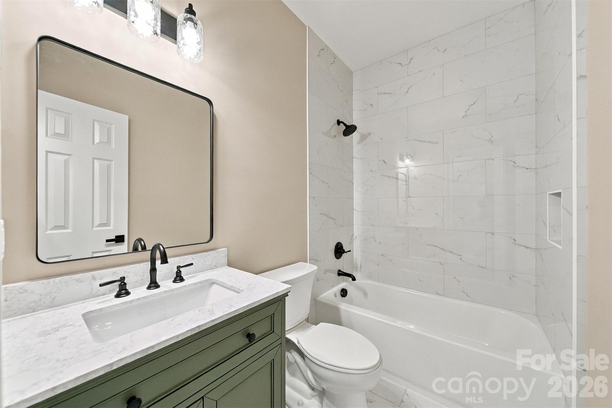 Hall bath with new vanity, toilet and tub! - 3442 Sourwood Court, Lincolnton