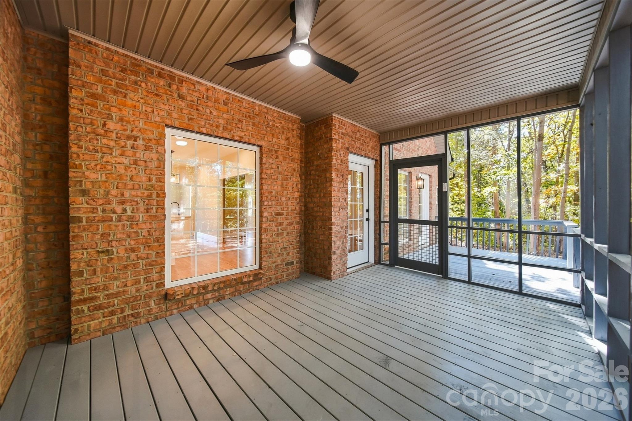 Imagine plants, a comfy couch, a TV - all the possibilities in this screened in porch! - 3442 Sourwood Court, Lincolnton