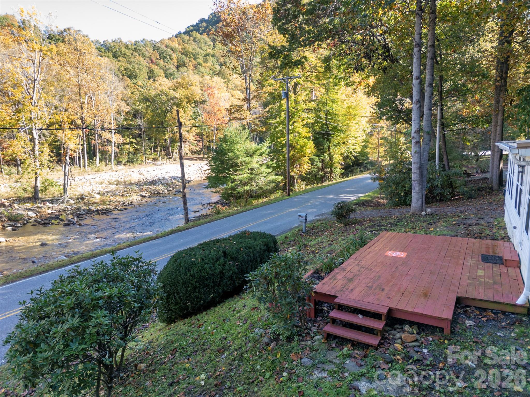 Front deck offers a wonderful place to enjoy the sights and sounds of the river. - 13858 Cruso Road, Canton