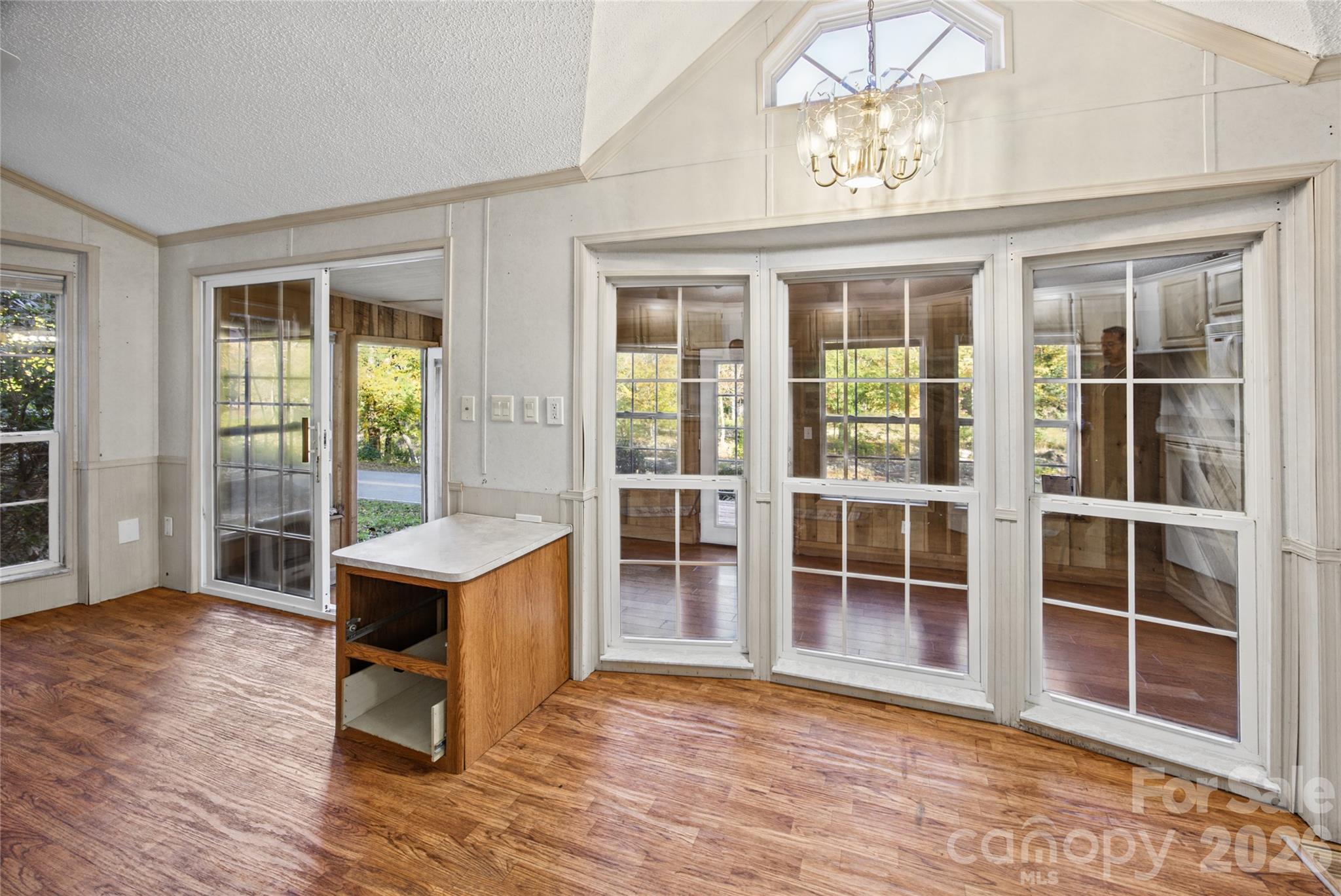 Open living area provides flexible space for dining and relaxing. - 13858 Cruso Road, Canton