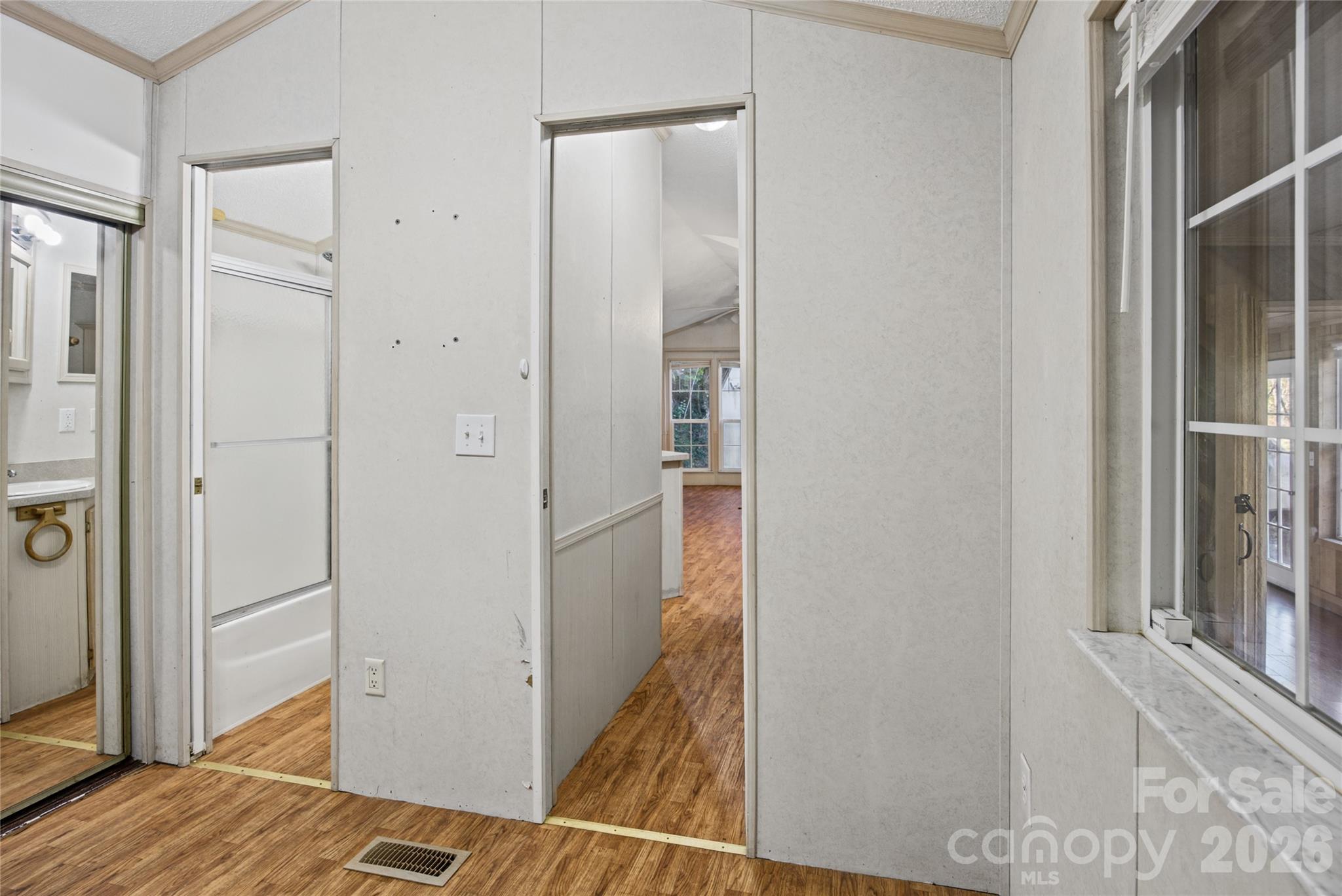 Interior hallway with access to the bathroom and adjoining rooms. - 13858 Cruso Road, Canton