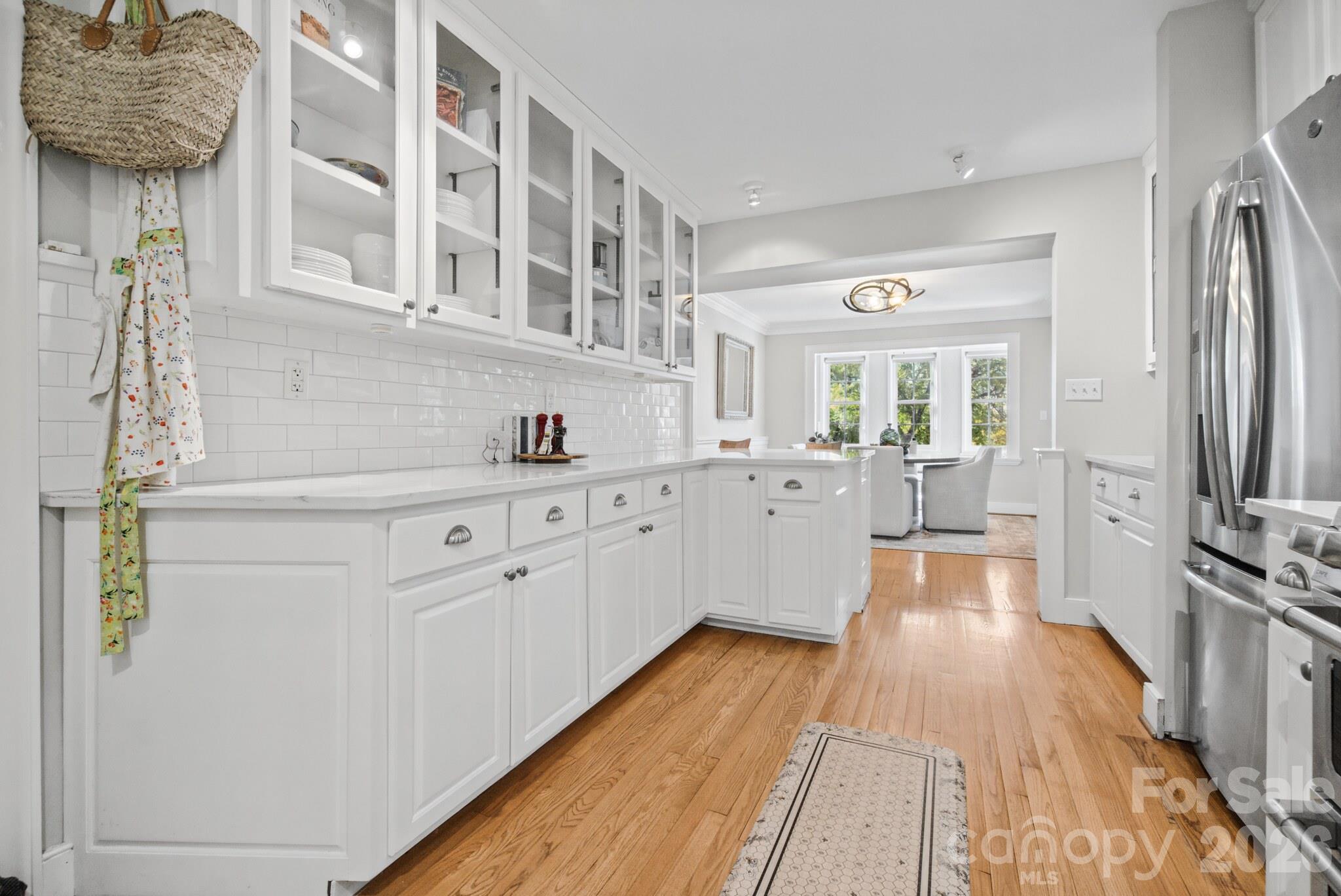 Glass Door Cabinetry and Timeless Subway Tile - 185 Macon Avenue, Asheville