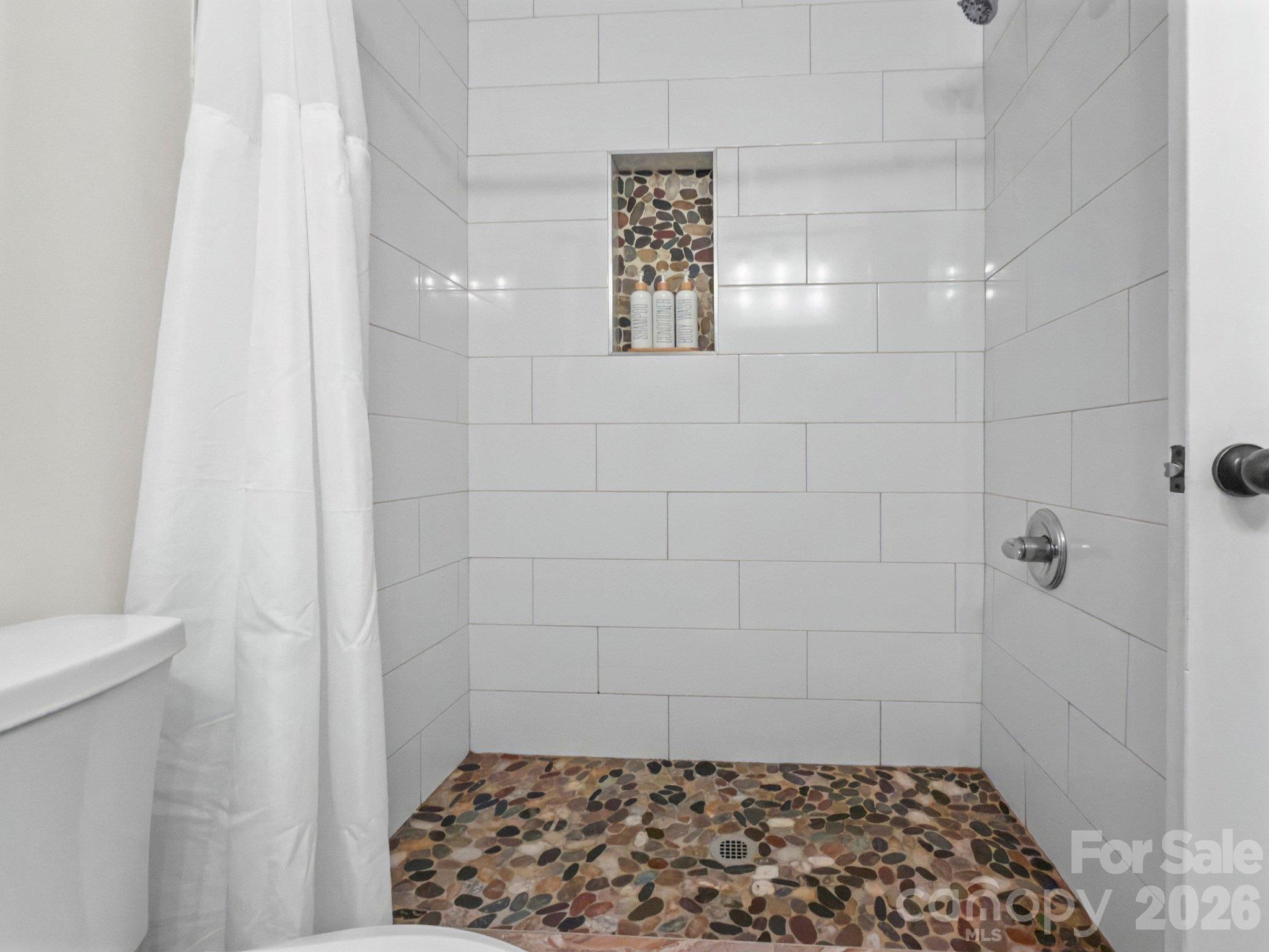 Full bathroom with updated stone shower - 105 Brockway Drive, Mooresville