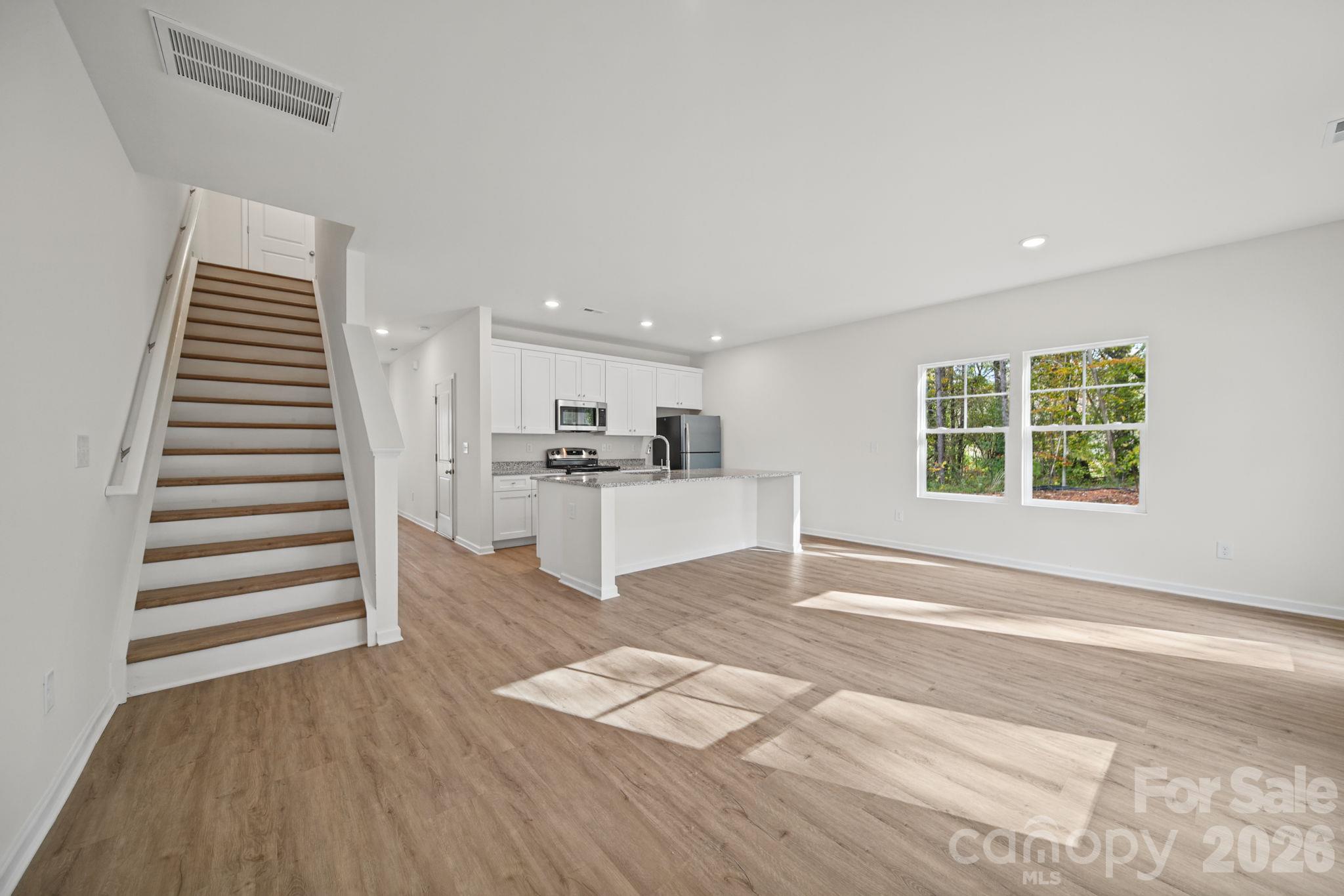 Kitchen, Great Room and Staircase - 3266-3270 Loop Road, Lincolnton