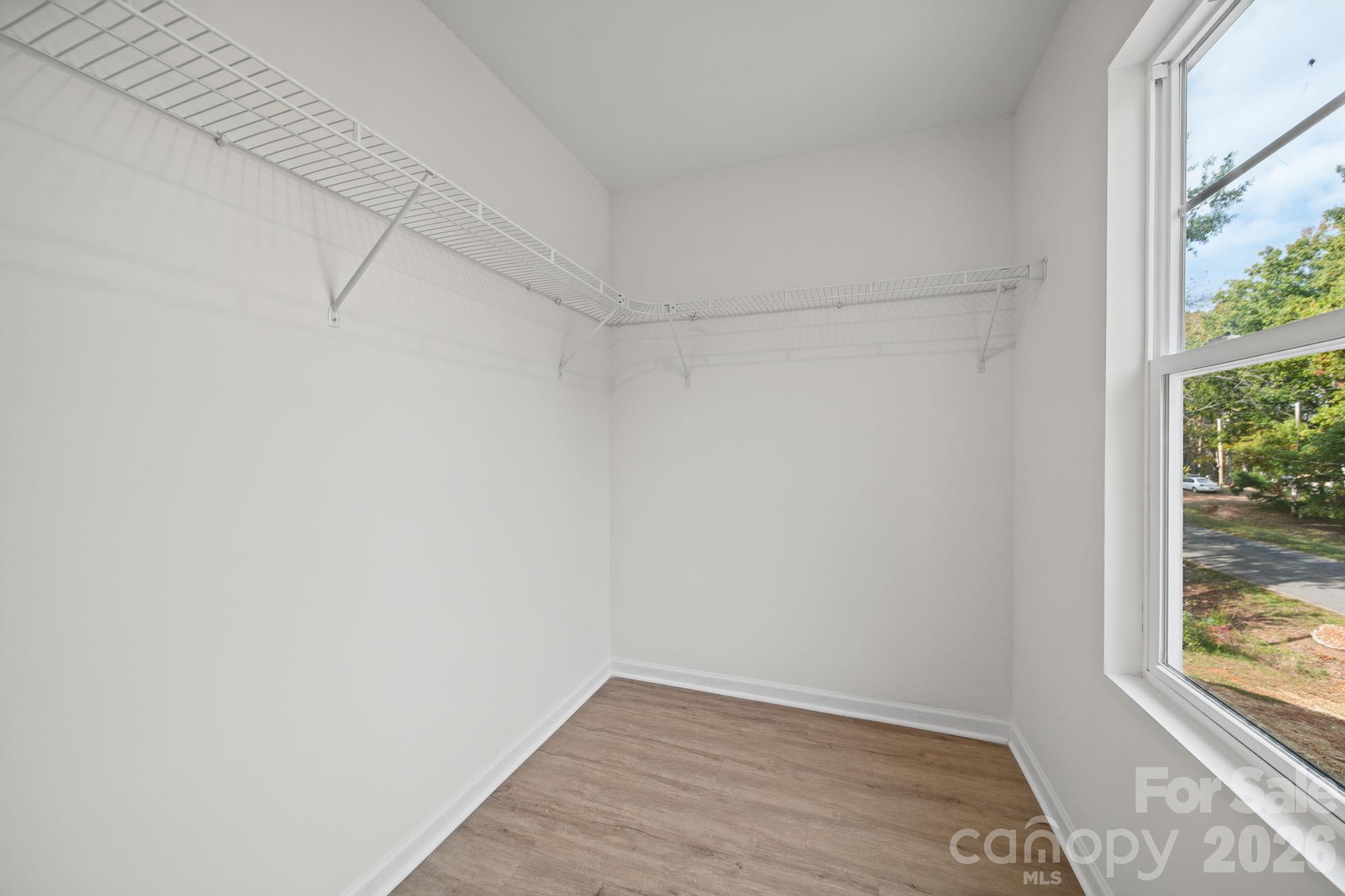 Walk-in Closet Primary Bedroom - 3266-3270 Loop Road, Lincolnton
