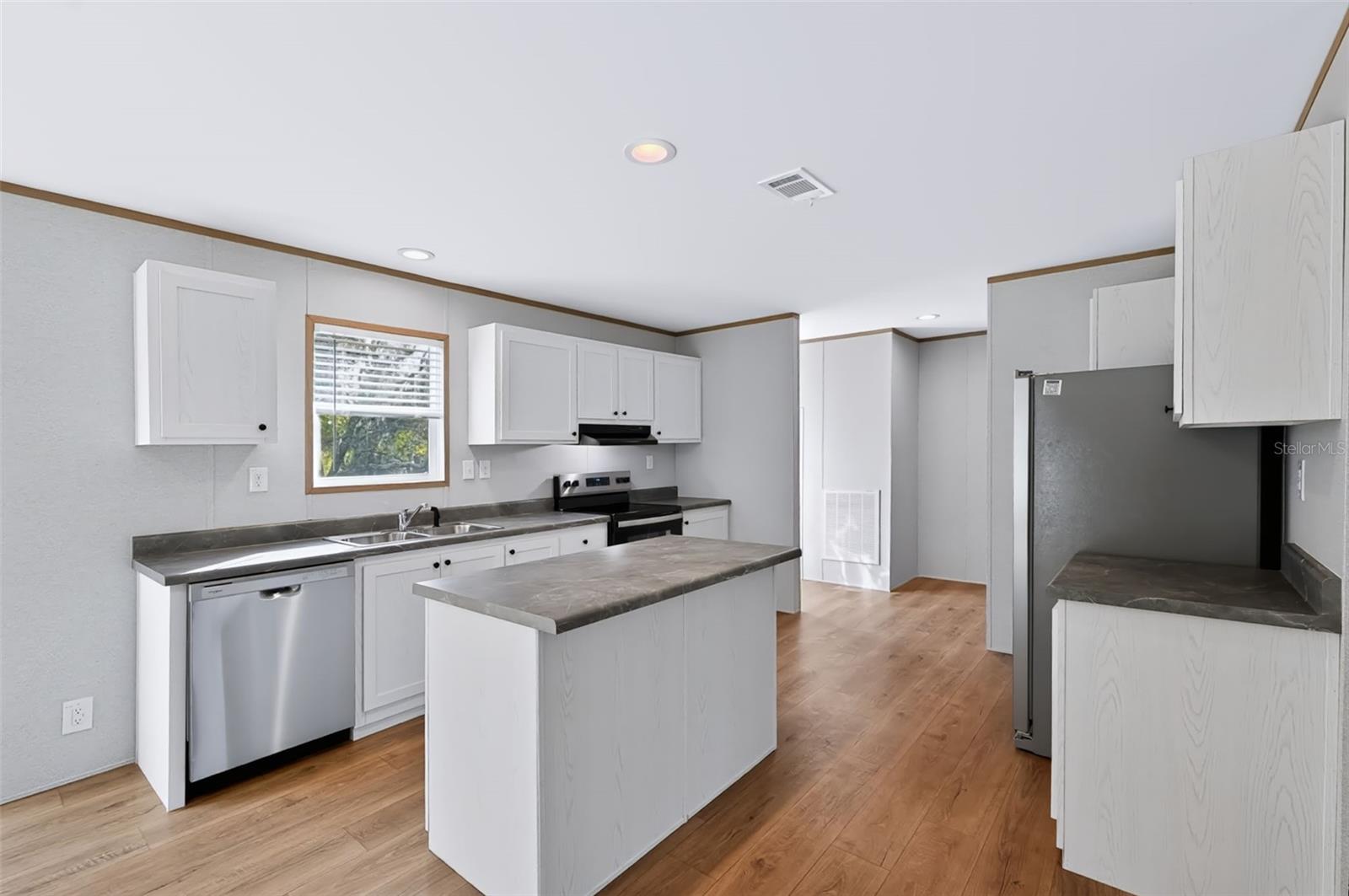 Kitchen with islang - 9638 FARGO DR, HUDSON