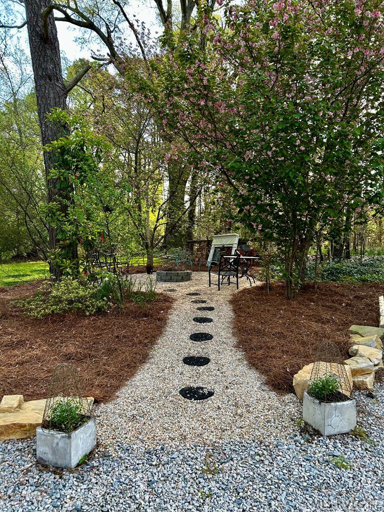 Steps leading to the garden sitting area - 401 Mosby Ave, Littleton NC 27850