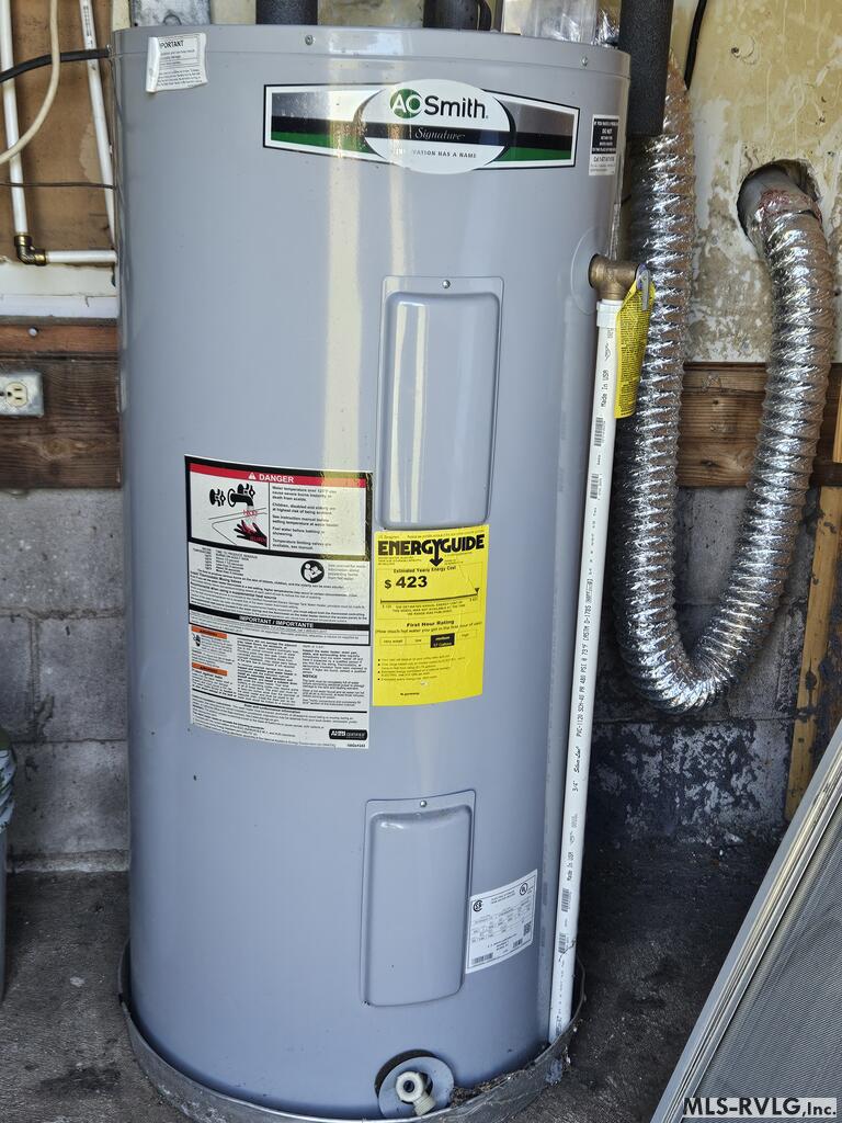 Water Heater, Located in attached storage building - 209 Wheeler St, Roanoke Rapids NC 27870