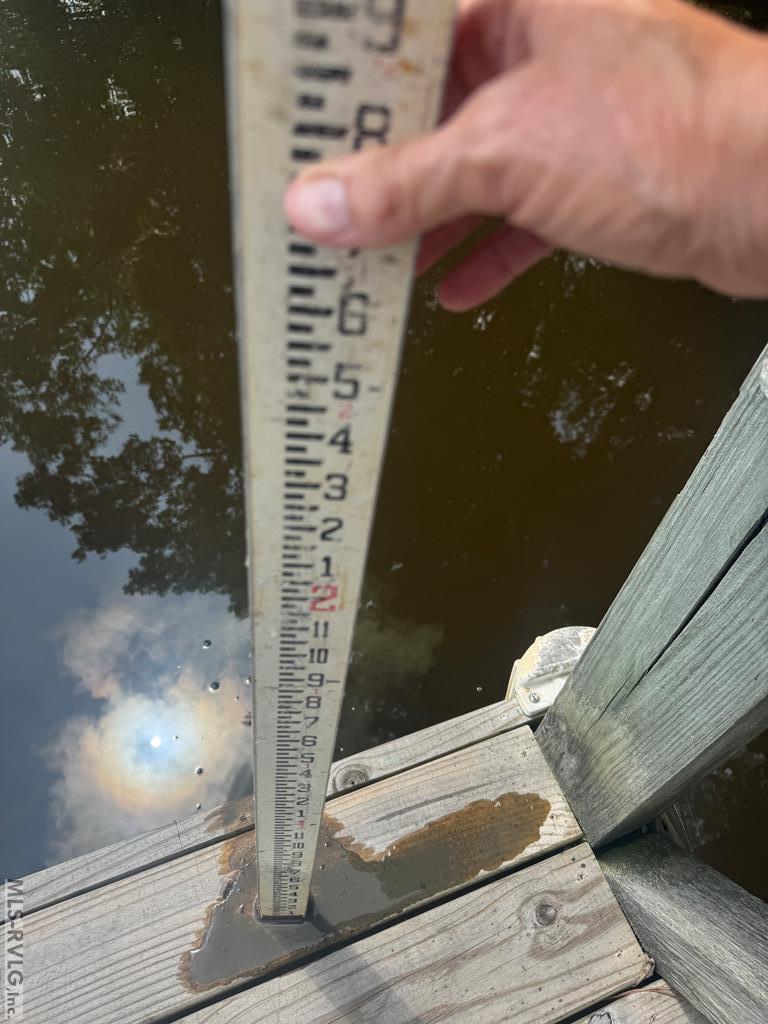 Water Depth at Boathouse on 07/08/26, Water measured 2'-7" on 07/08/26 at the boat dock nearest the mouth of the cove - 796 Tanglewood Drive, Bracey VA 23919