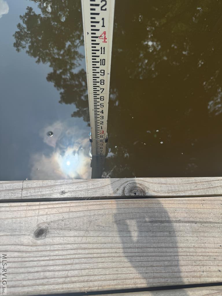 Water Depth at the Boathouse, This is the measurement on 07/08/26 2'-7" - 796 Tanglewood Drive, Bracey VA 23919
