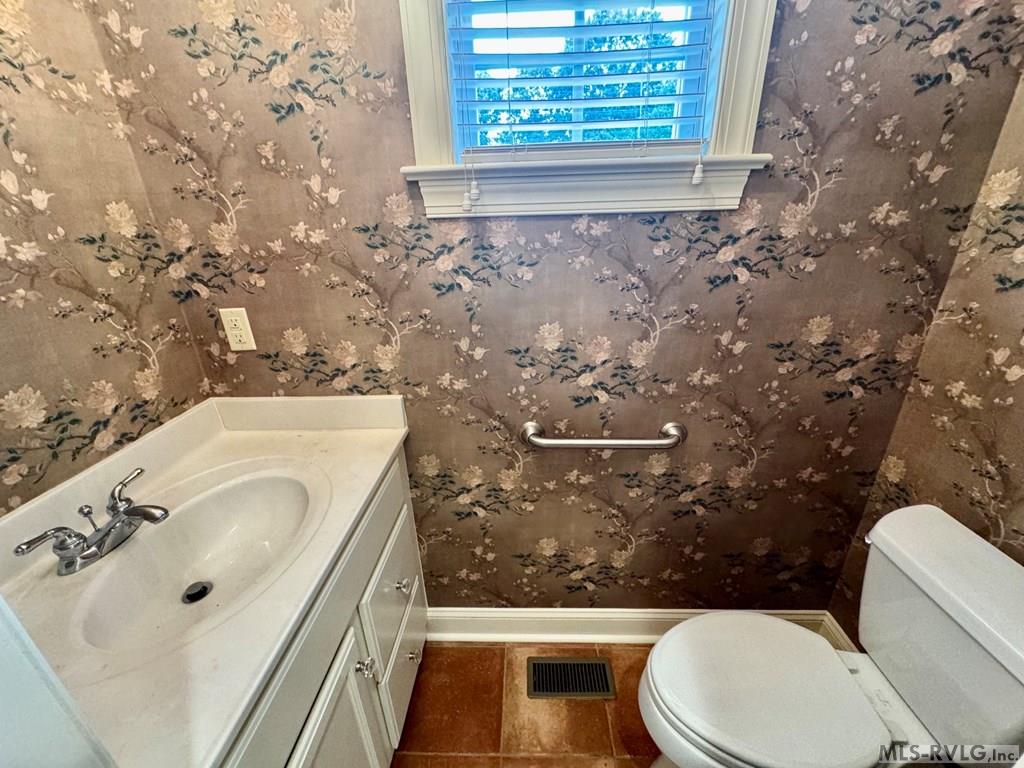 Half Bath off the Garage - 454 Grace Stone Drive, Clarksville VA 23927