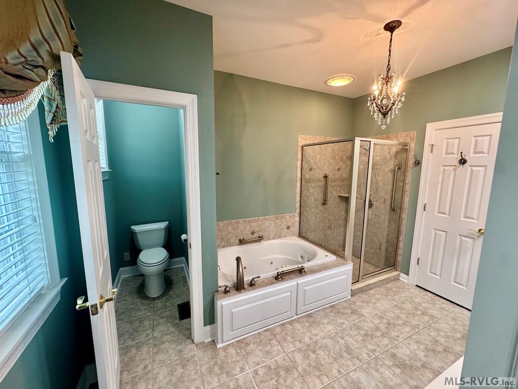 The Primary Suite Bath - 454 Grace Stone Drive, Clarksville VA 23927