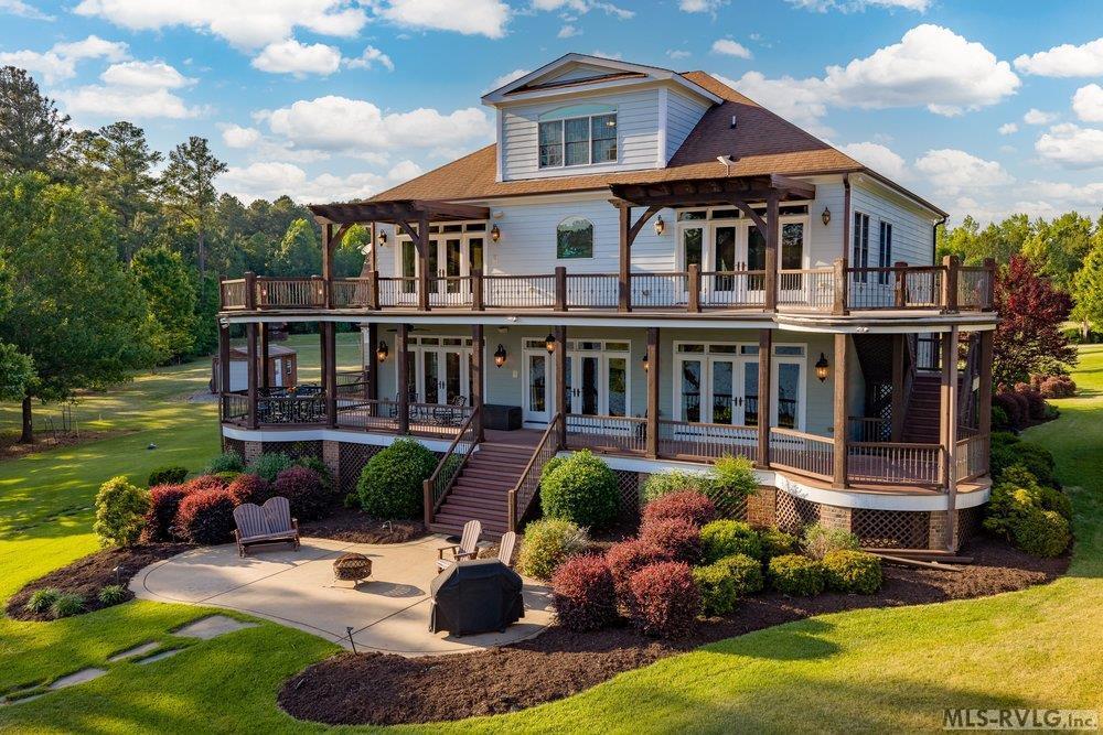 Lake Gaston Luxury Living, This exquisite Lake Gaston luxury estate perfectly blends grandeur with comfortable waterfront living. - 381 West Bend Dr., Gasburg VA 23857