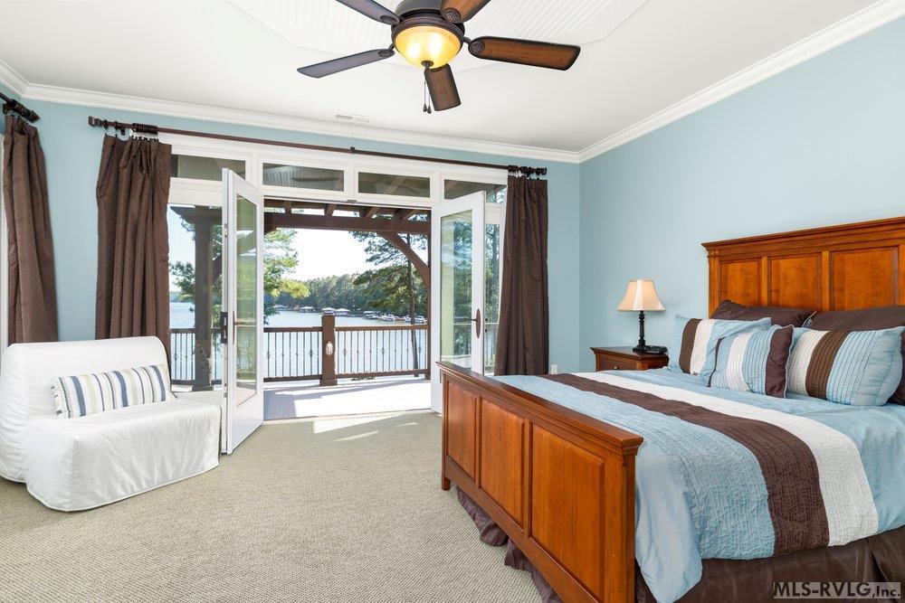Upper Level Lake Side Bedroom, A perfect retreat for guest with a view of Lake Gaston - 381 West Bend Dr., Gasburg VA 23857