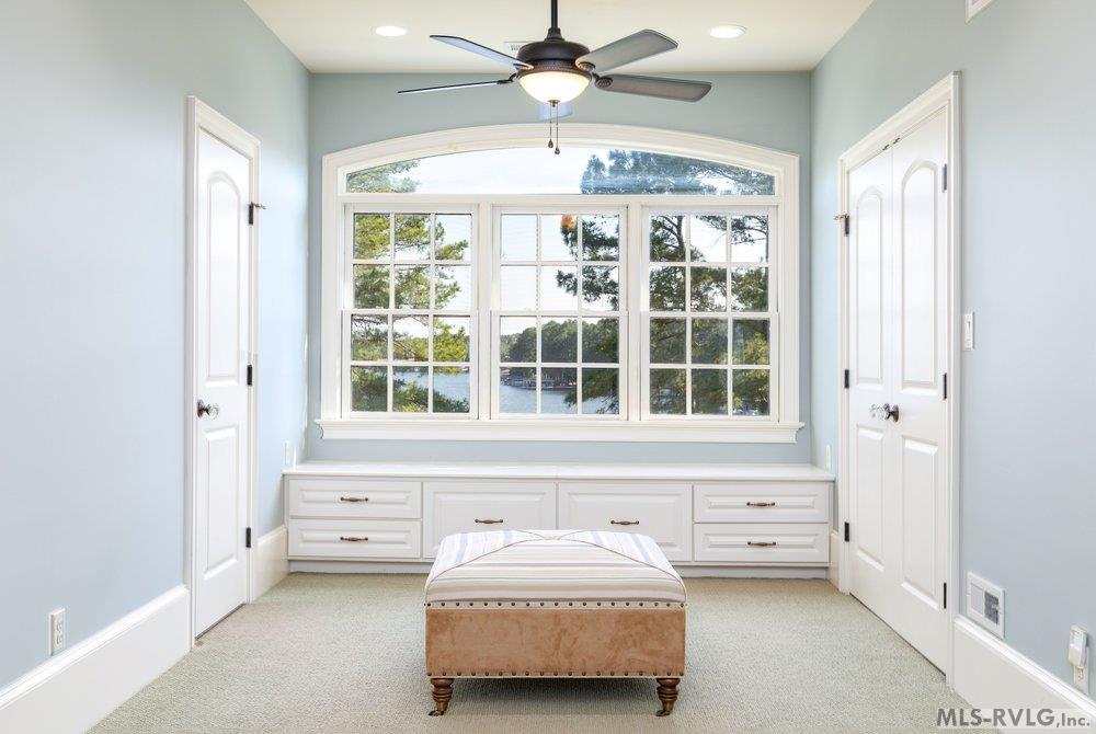 Bonus Room with a View, A view that blends fun activities with a clean, relaxing vibe, located right in the heart of the upper-level recreational area. - 381 West Bend Dr., Gasburg VA 23857