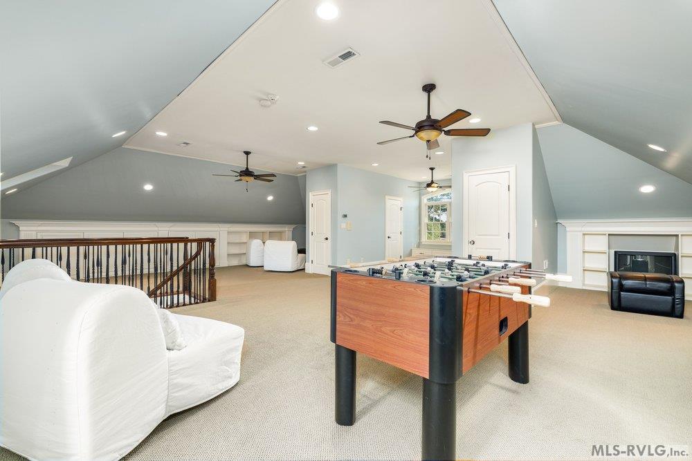 Recreational Game Room - Bonus room, A foosball table surrounded by plenty of seating, perfect for gaming sessions or unwinding with a good book. - 381 West Bend Dr., Gasburg VA 23857