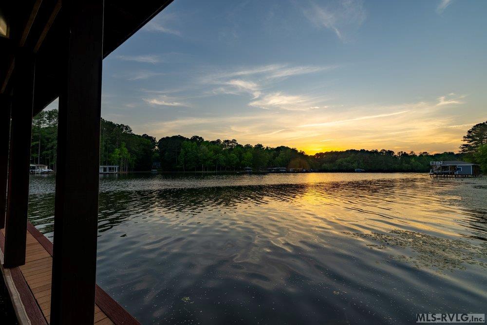 Golden Hour View, The perfect blend of natural beauty and peaceful lakeside living captures the true essence of tranquility. - 381 West Bend Dr., Gasburg VA 23857
