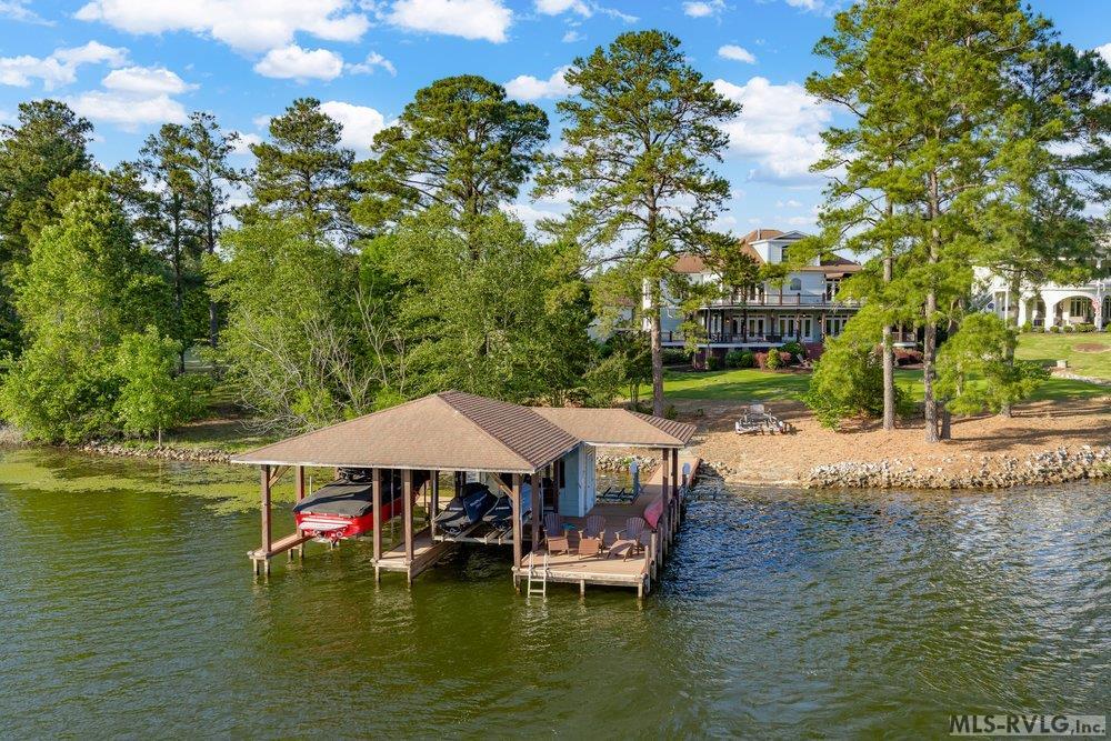 Private Double Boat House, This property also includes a third boat slip conveniently located at the community boathouse, just a short walk from home. - 381 West Bend Dr., Gasburg VA 23857